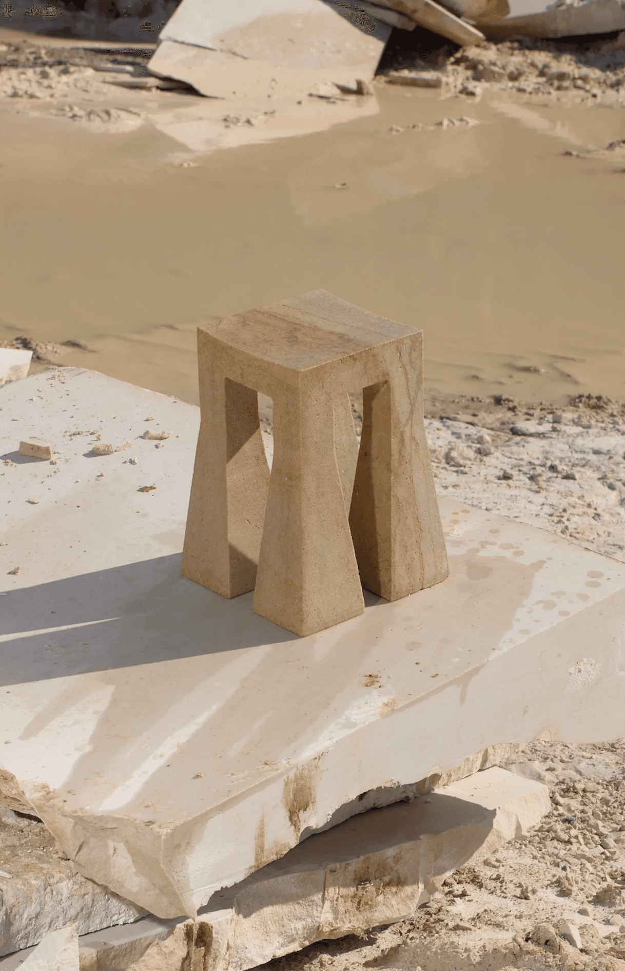 Sand Lada stool in natural quartz sandstone with transparent finish by Jiri Krejcirik