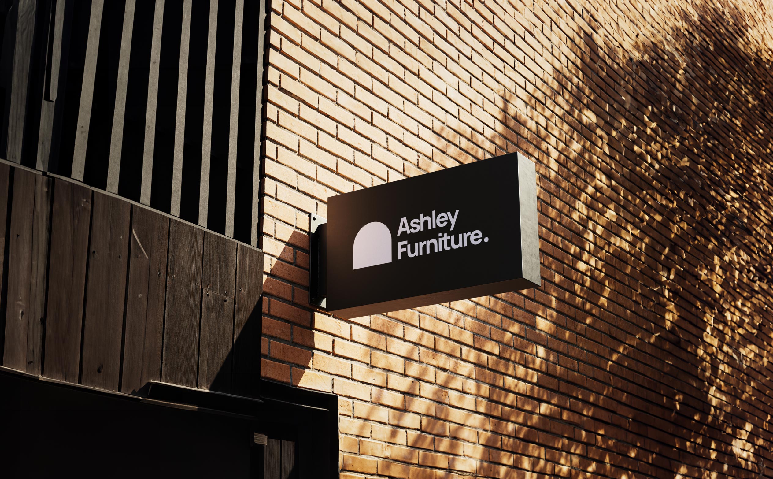 Ashley Furniture sign board, exterior brick wall 