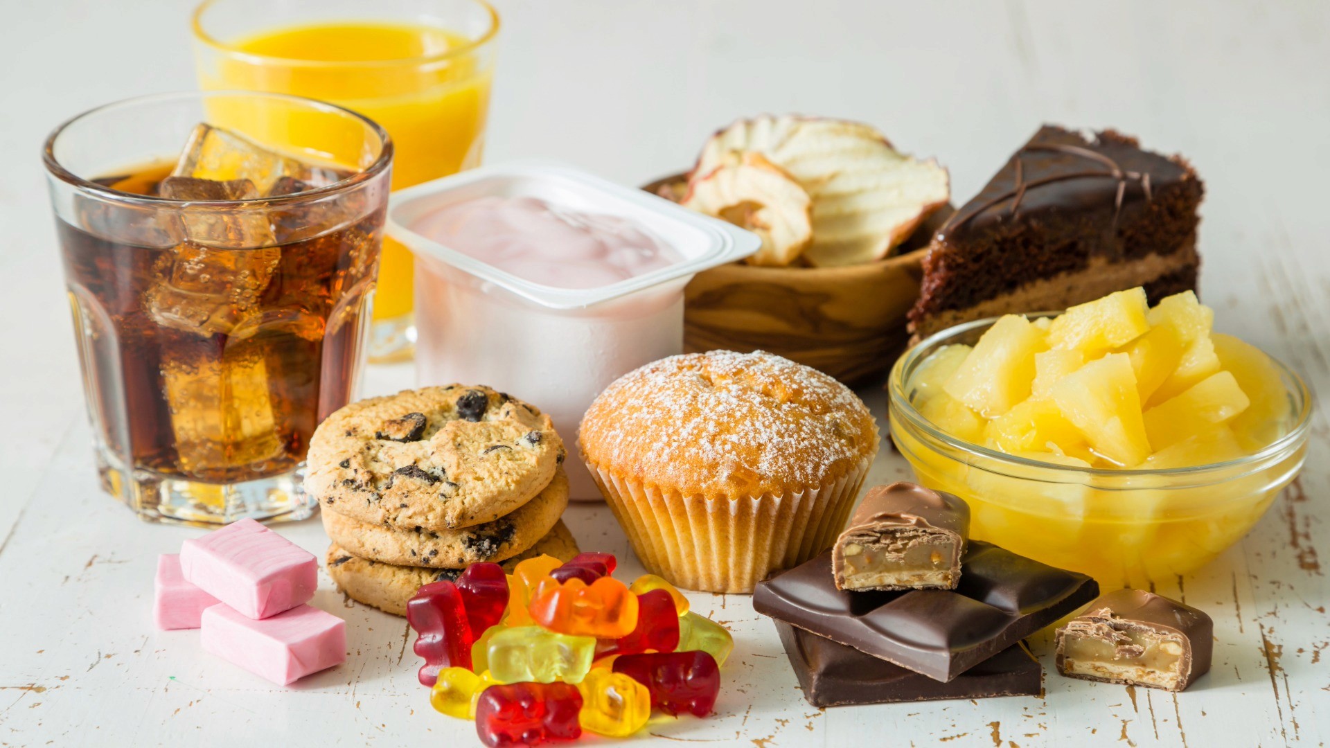 Image of un-healthy sugar-filled food laid out