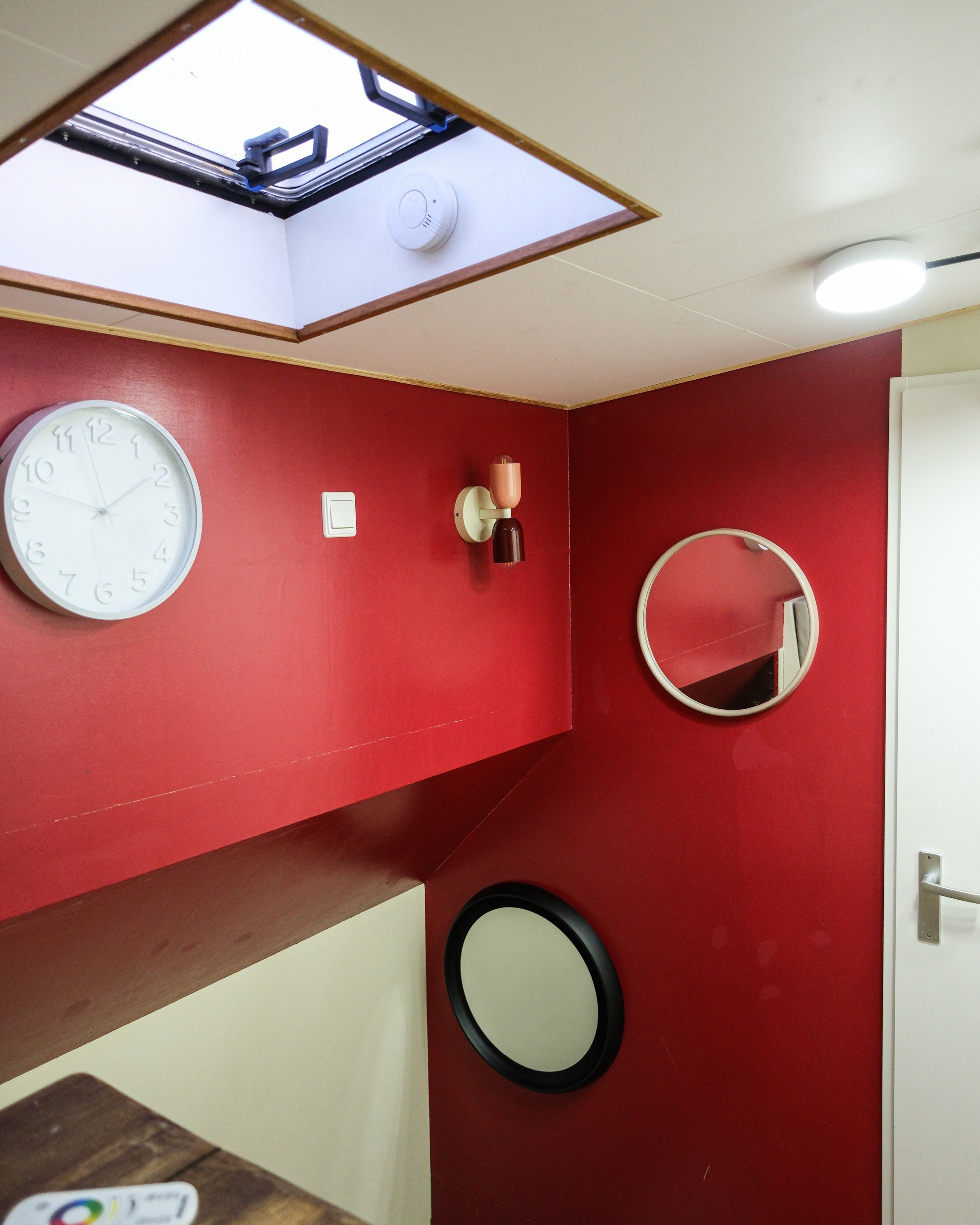 Modern office desk with angular design and leather chair