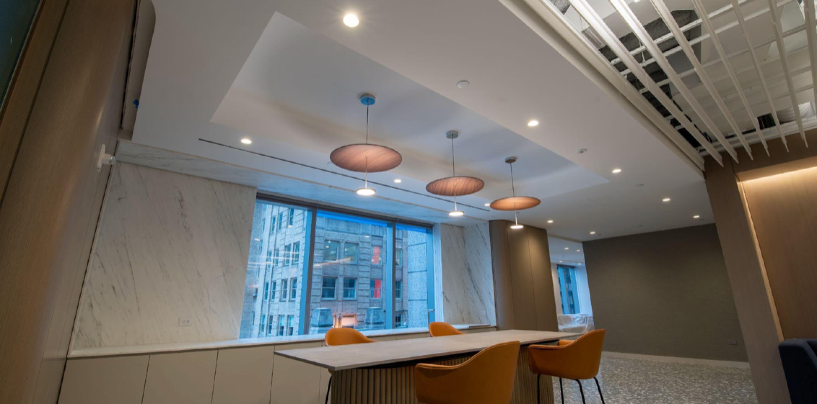 A conference room with hanging lamps