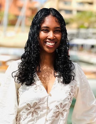 man standing in front of window