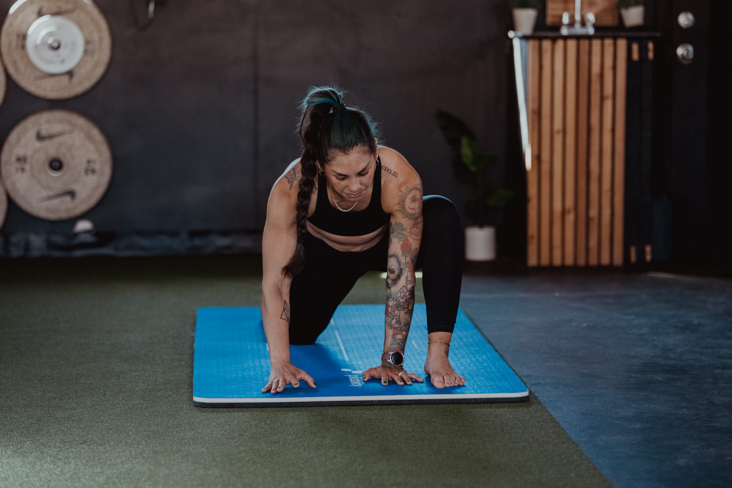 person using mat - What Does Muscle Stiffness Feel Like