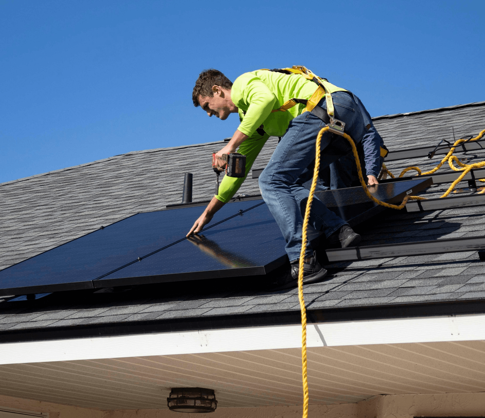 Solar panel installation Technician using level tool