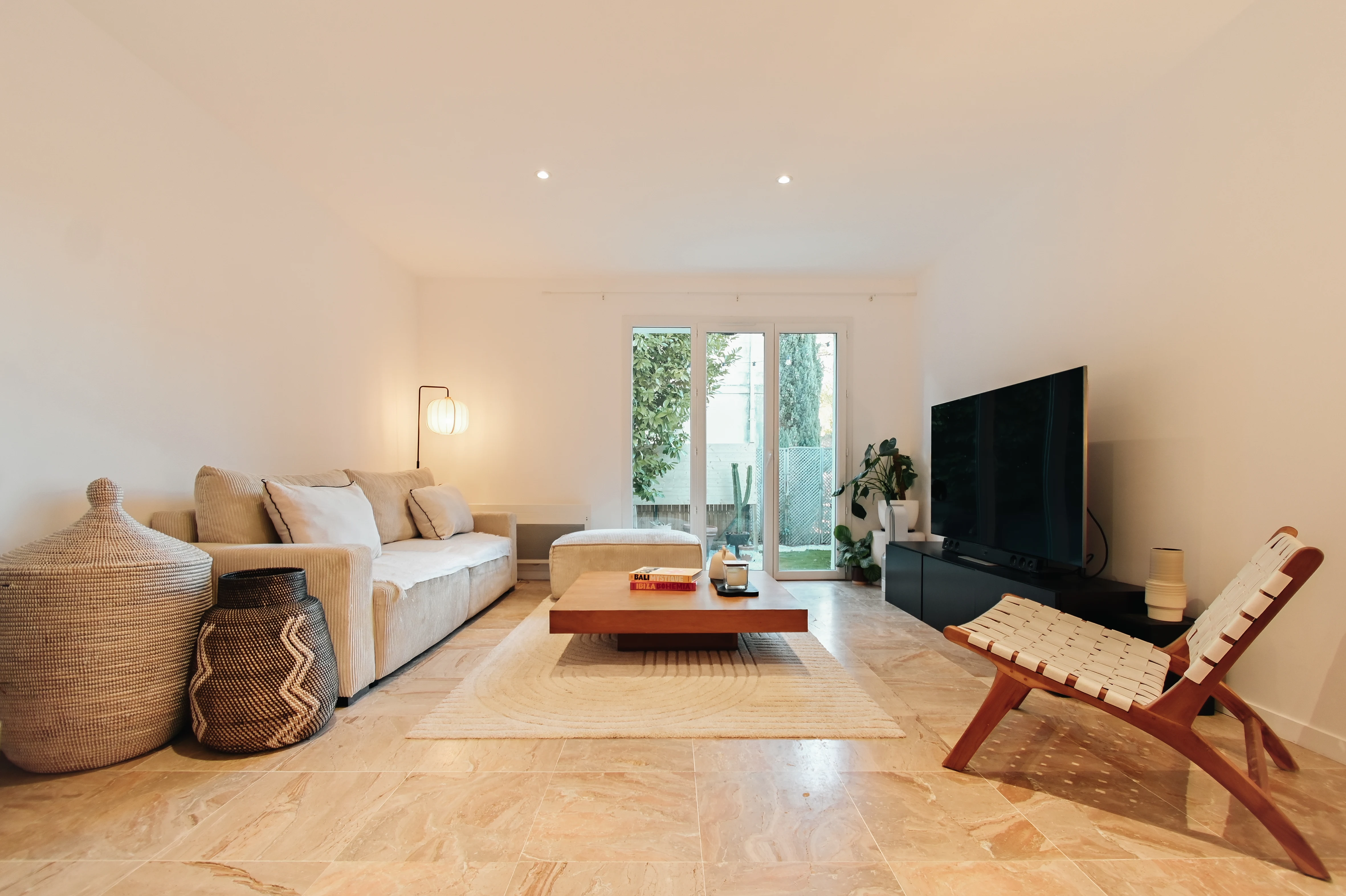 Streetside billboard with flyposters of the Batch.Works brand and illustrations