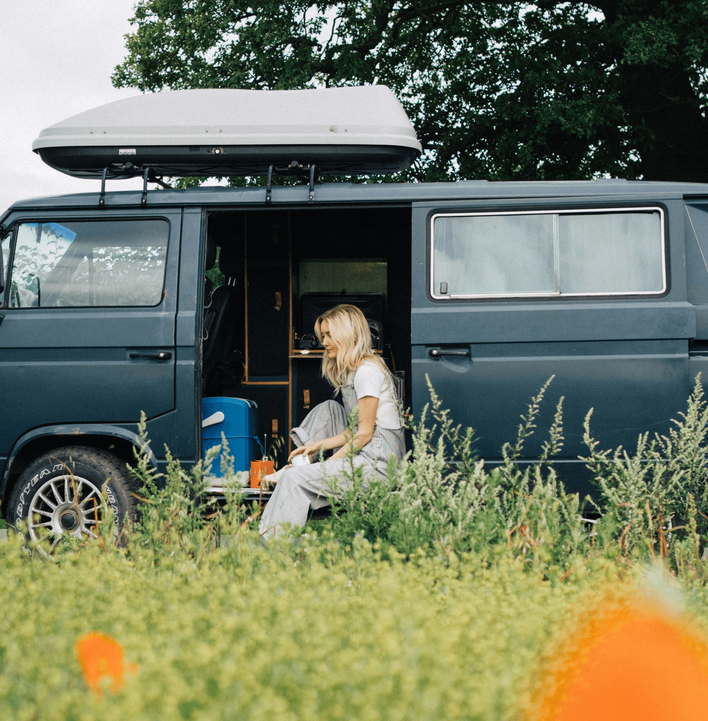 a man with a goatee smiles at the camera
