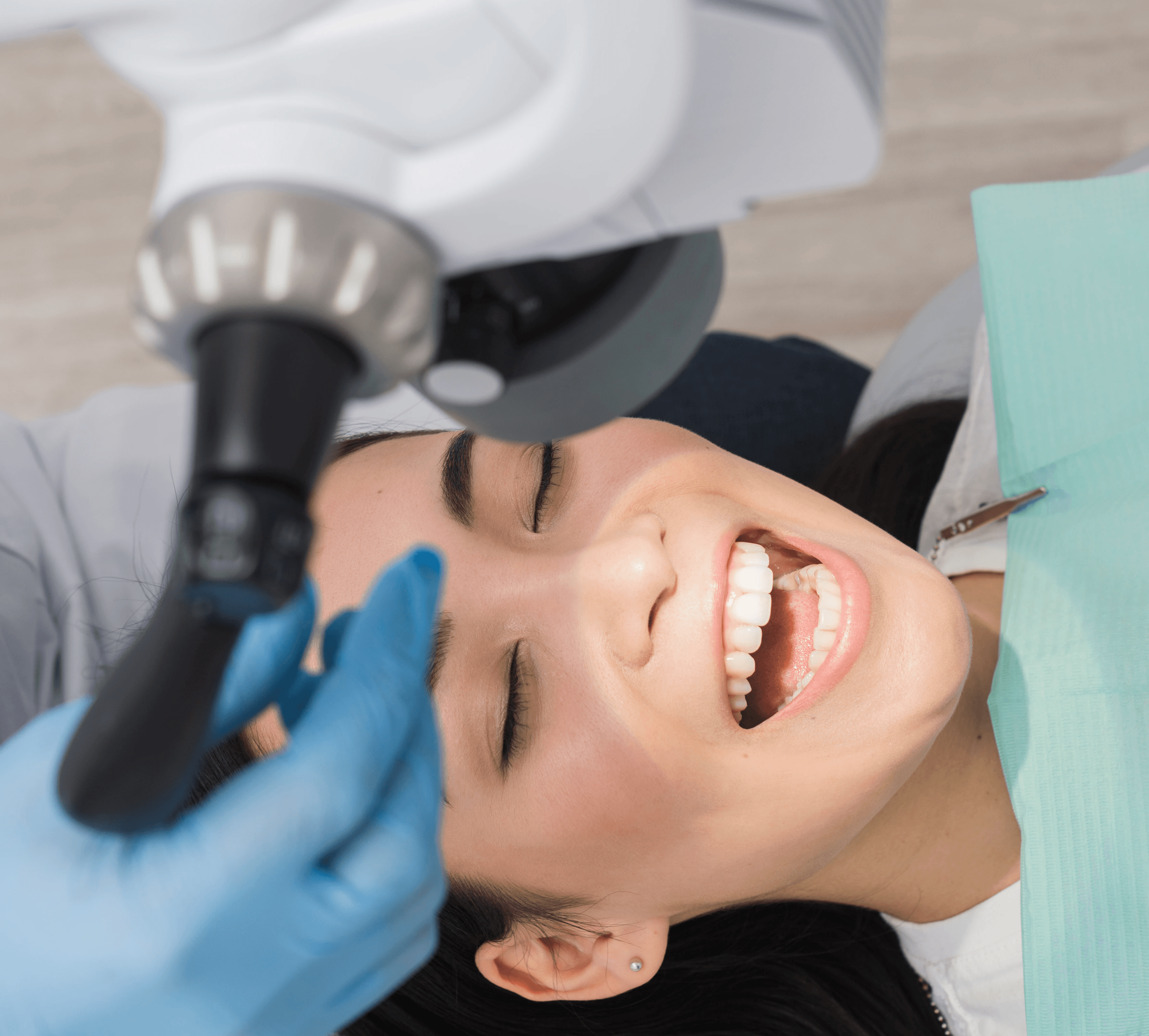 woman sitting around table holding tablet
