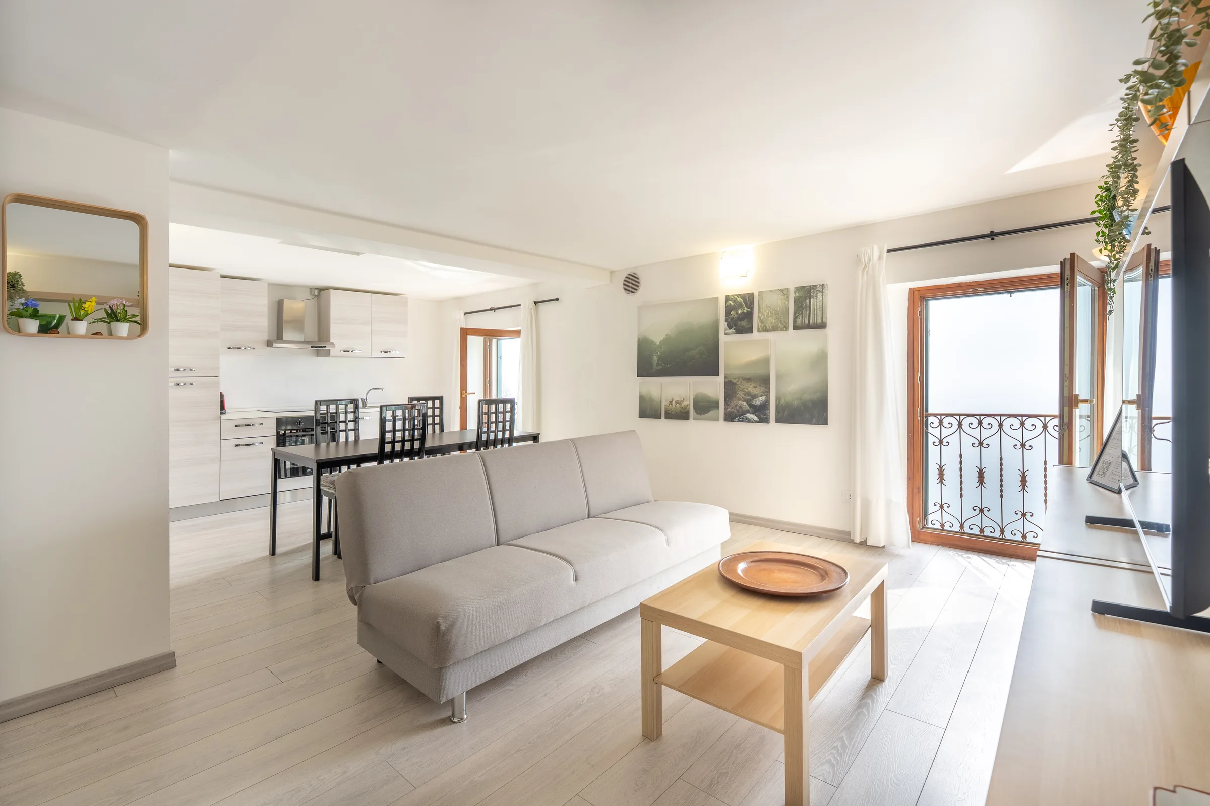 Bright residential living room — Lake Como, Italy. Photography by Yunes Calore.