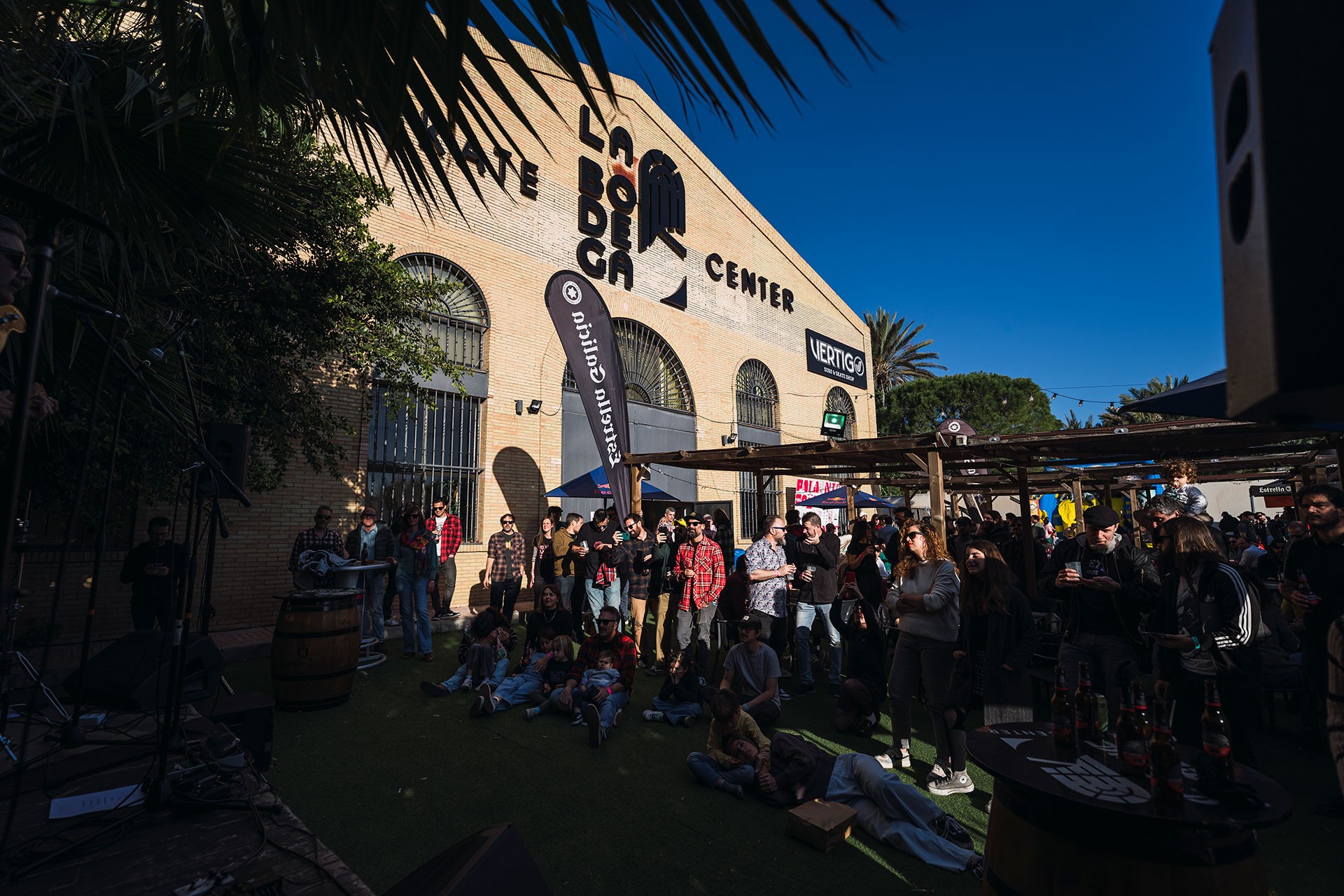 Young DJ performing at a live music event.