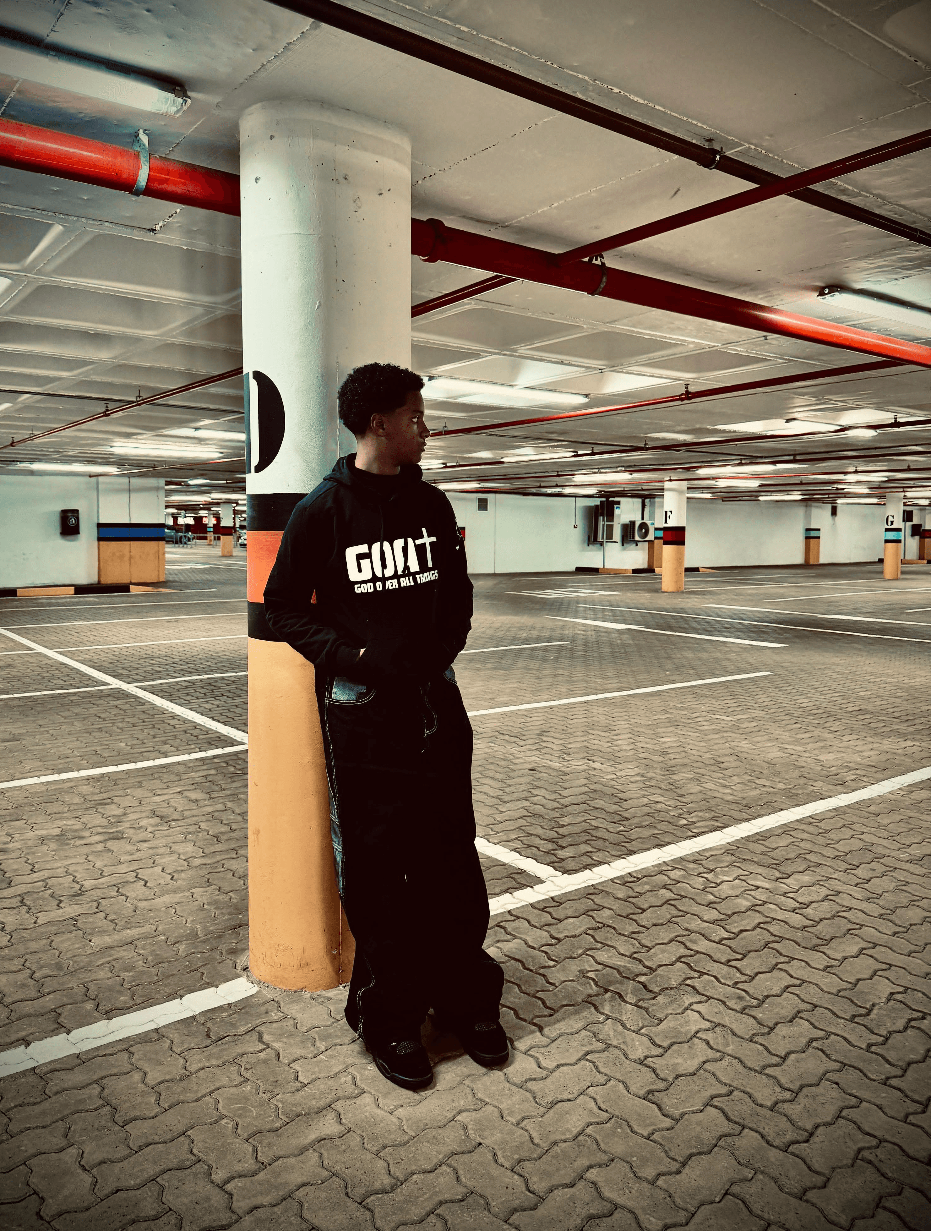 BG of guy showcasing goat hoodie