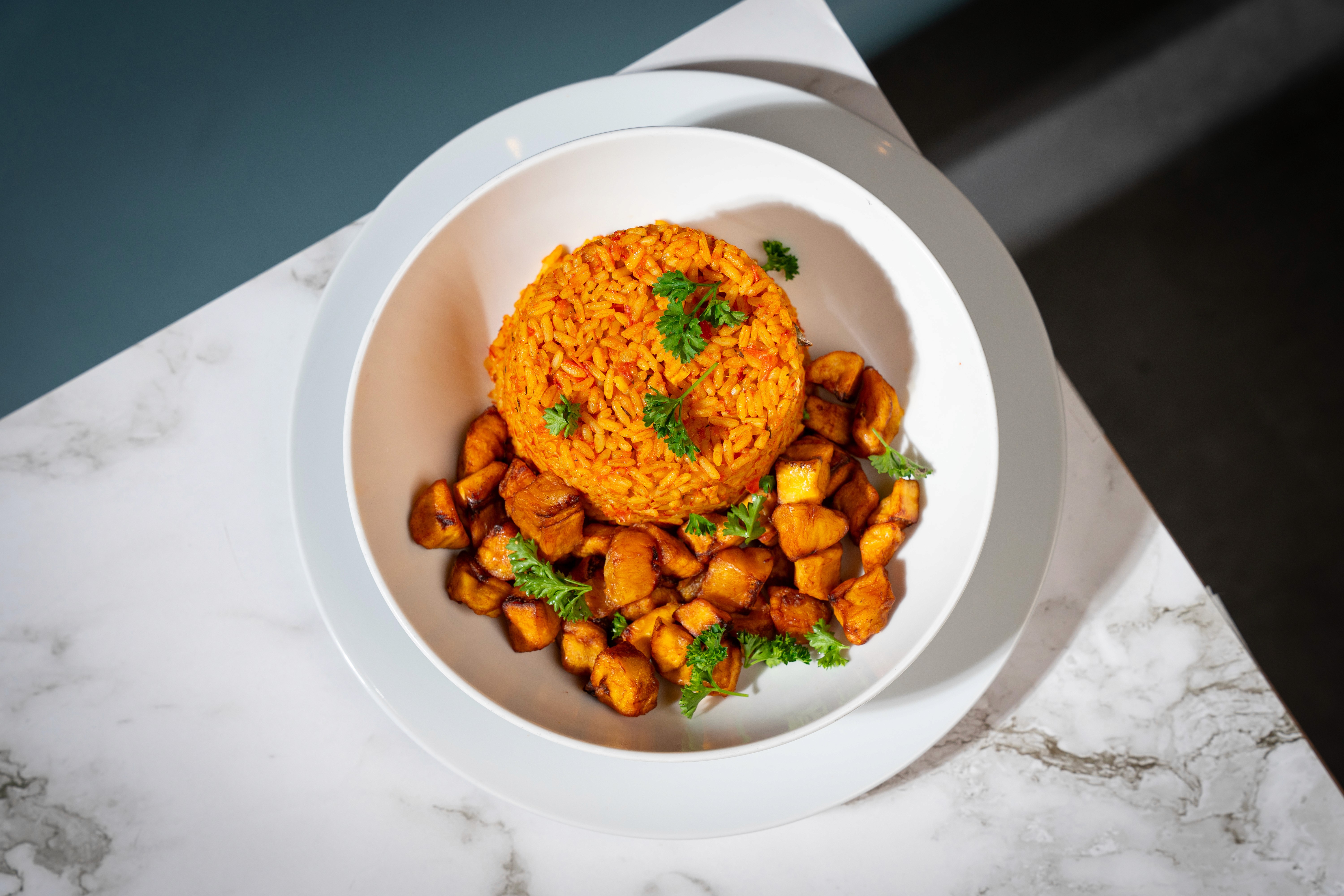 A man holding a large piece of meat in his hands
