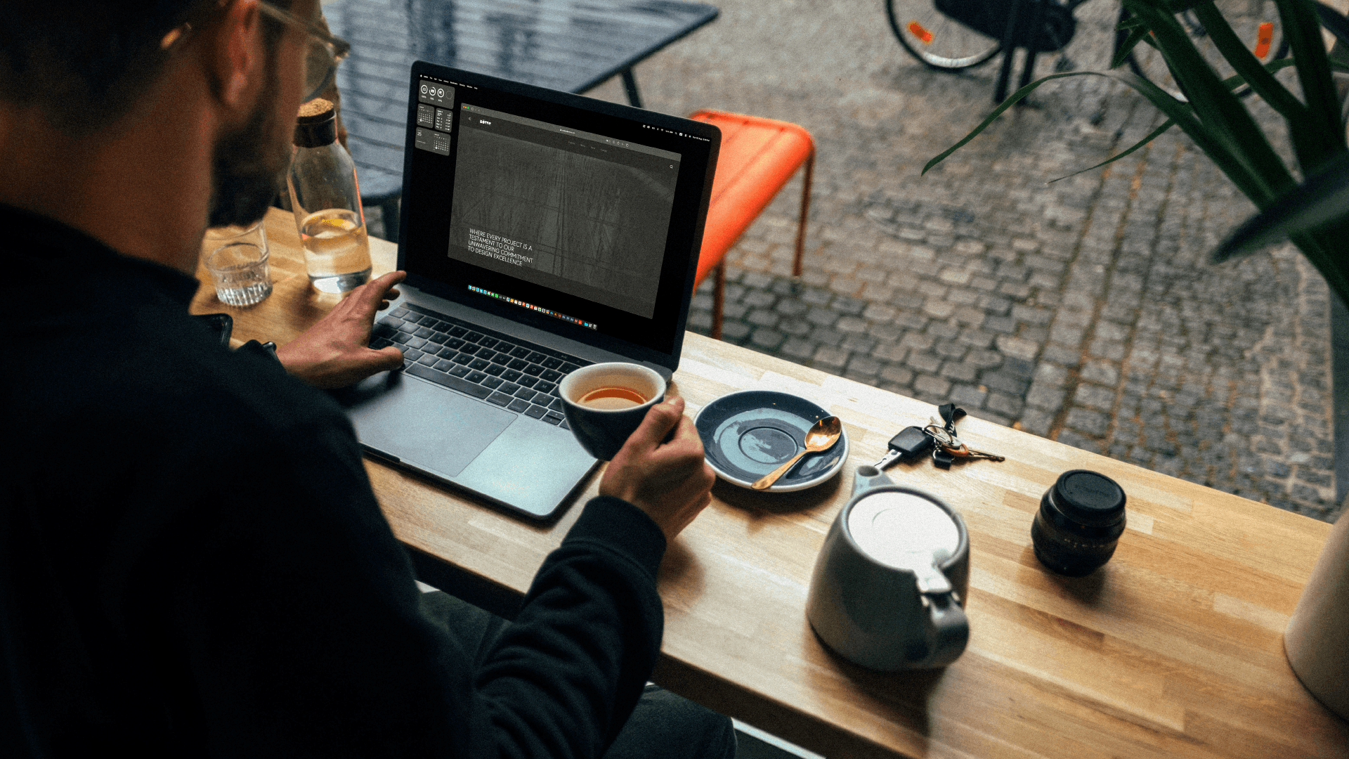 A dirty, old white car with a parking ticket.