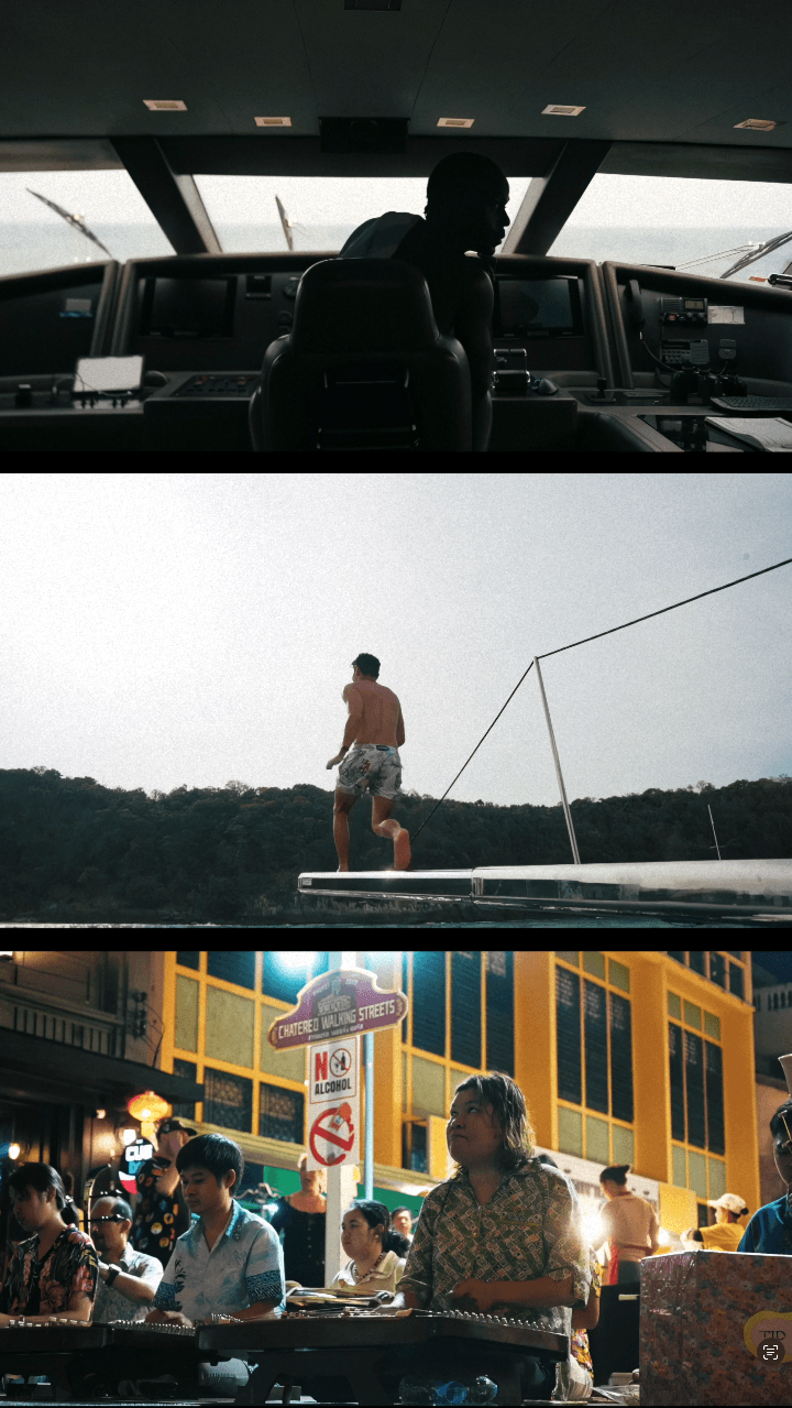 Bride sitting on ground against wall, groom standing nearby