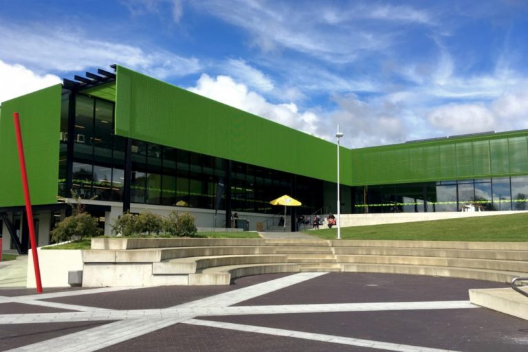 white university during daytime