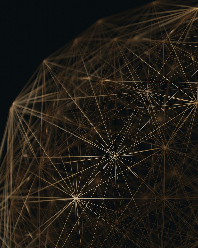 A dark background featuring a network of glowing lines and nodes, resembling a digital web or connections.