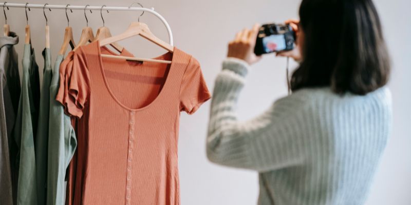 A Malaysian business owner taking photos of her products for social media