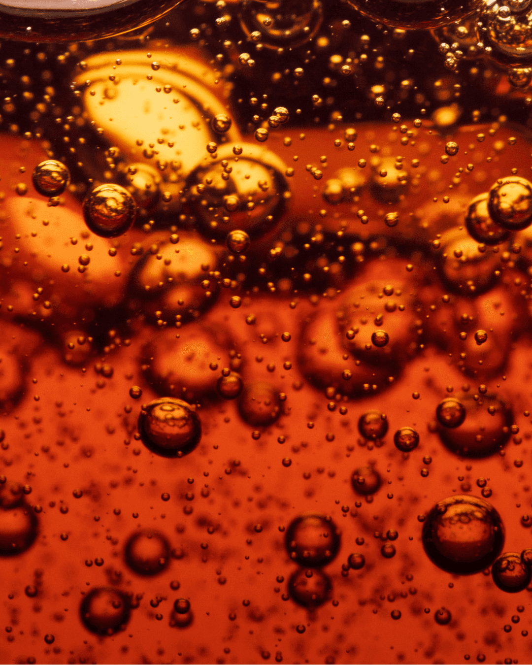 Close up of a carbonated beverage.