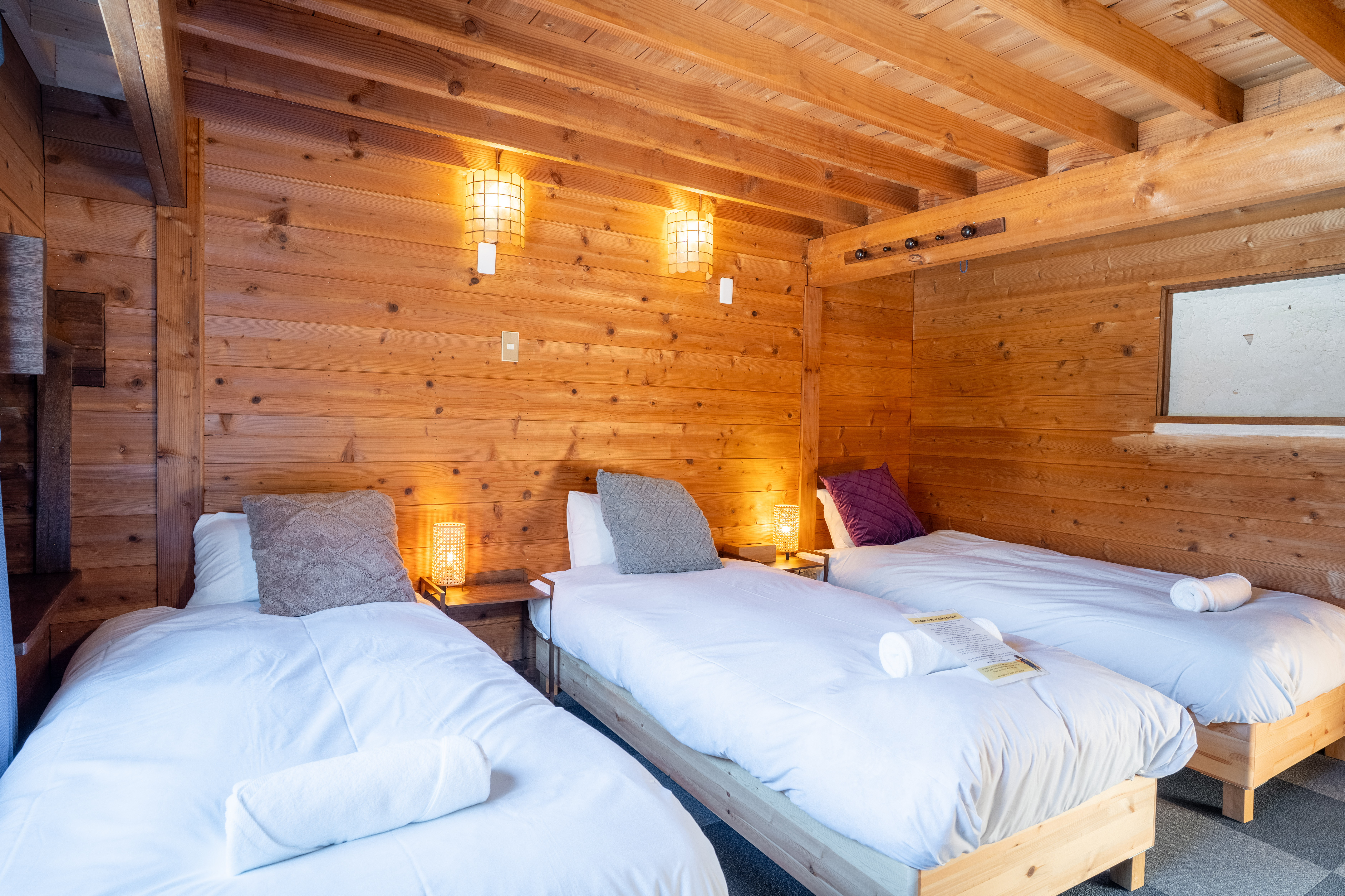Quad room interior at Sneaky Peaks, Hakuba