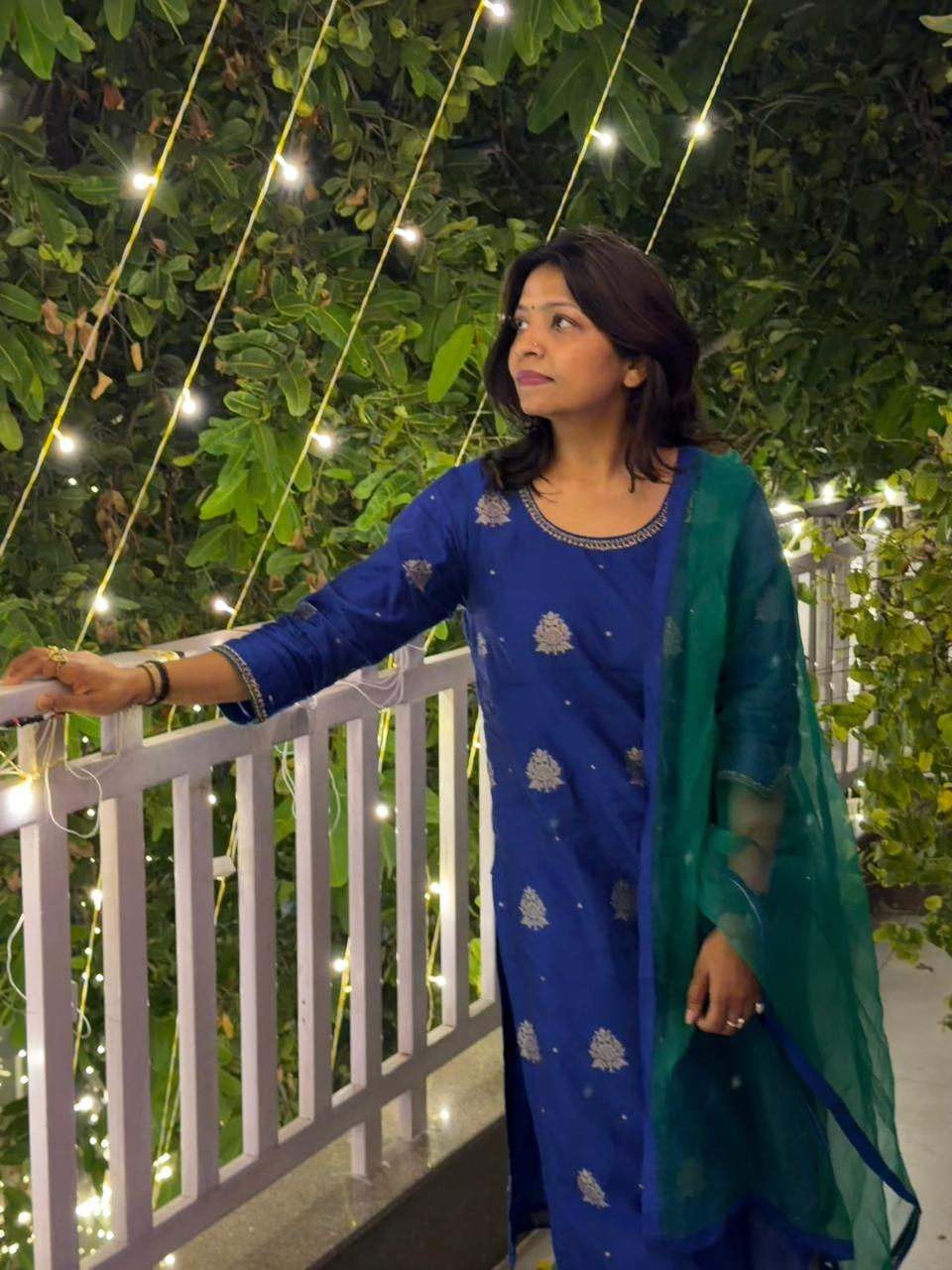 woman in white and blue checked dress shirt