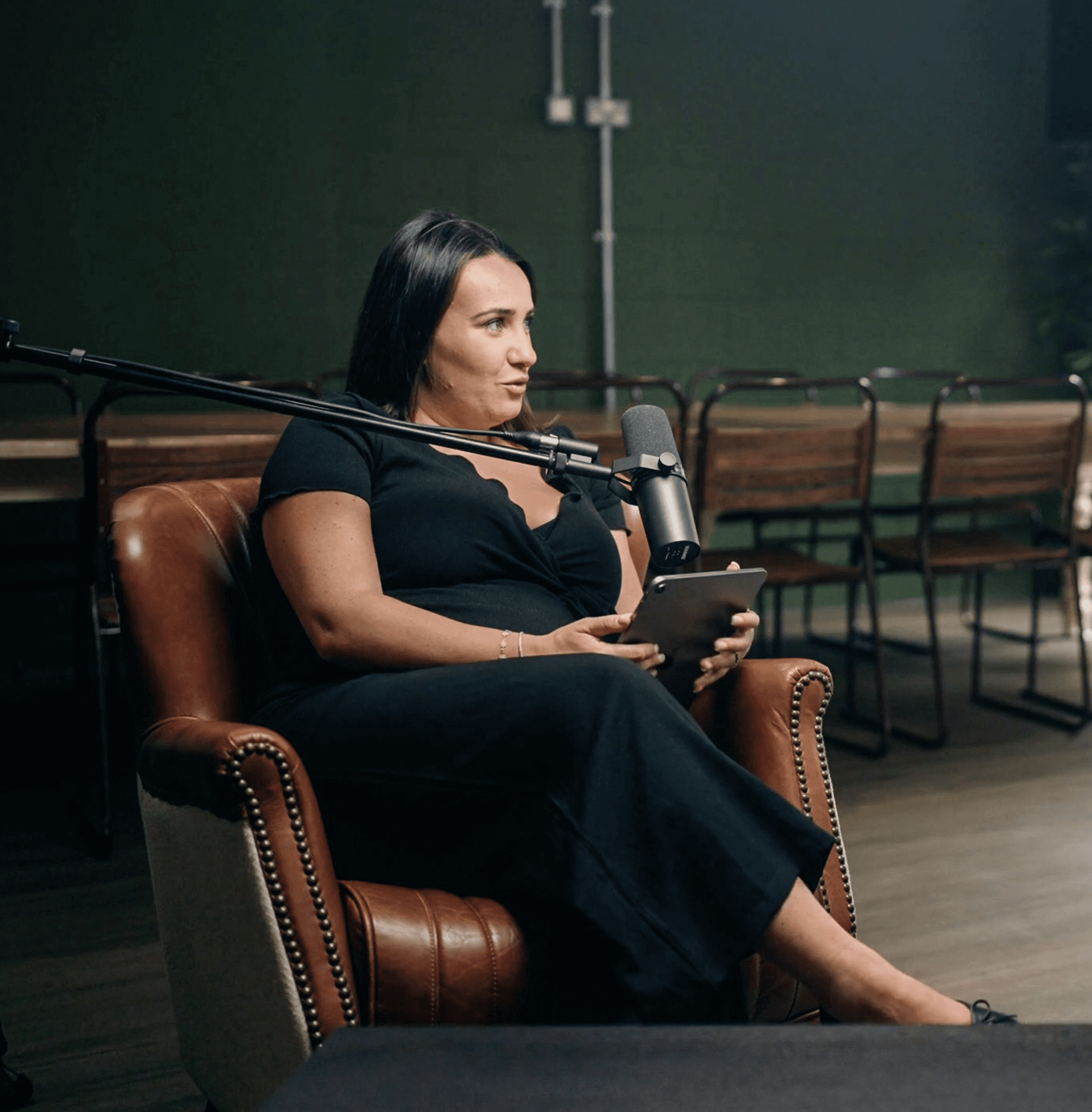 People using laptop and discusing