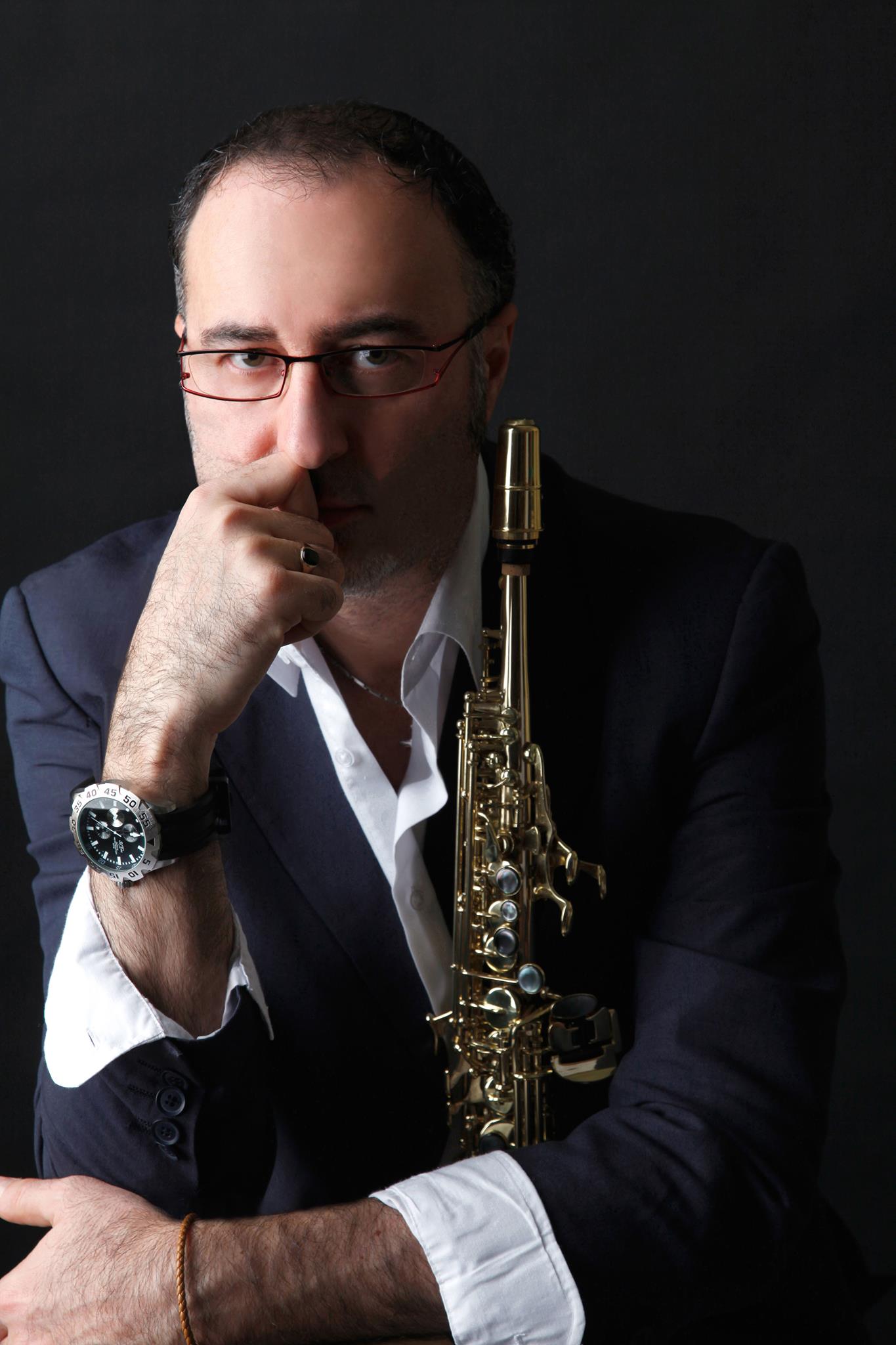 Music Producer sitting at his desk