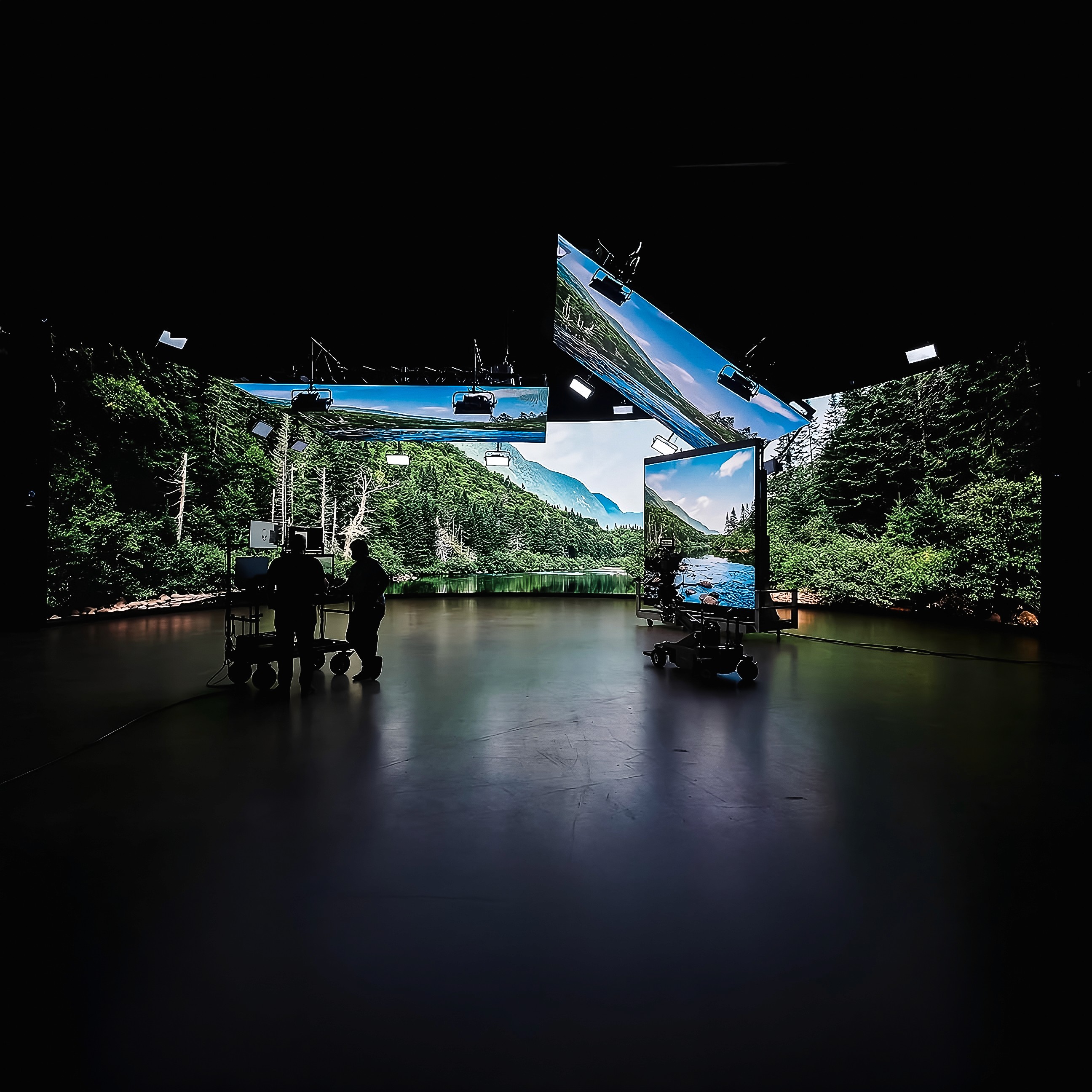 Film studio mels with four big screen showcasing a landscape