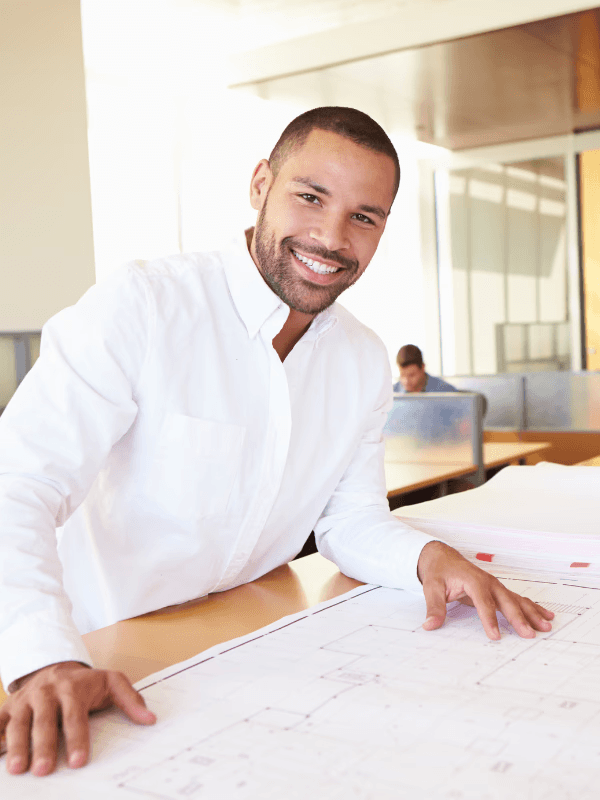 Architect smiling happily after being hired for a new project