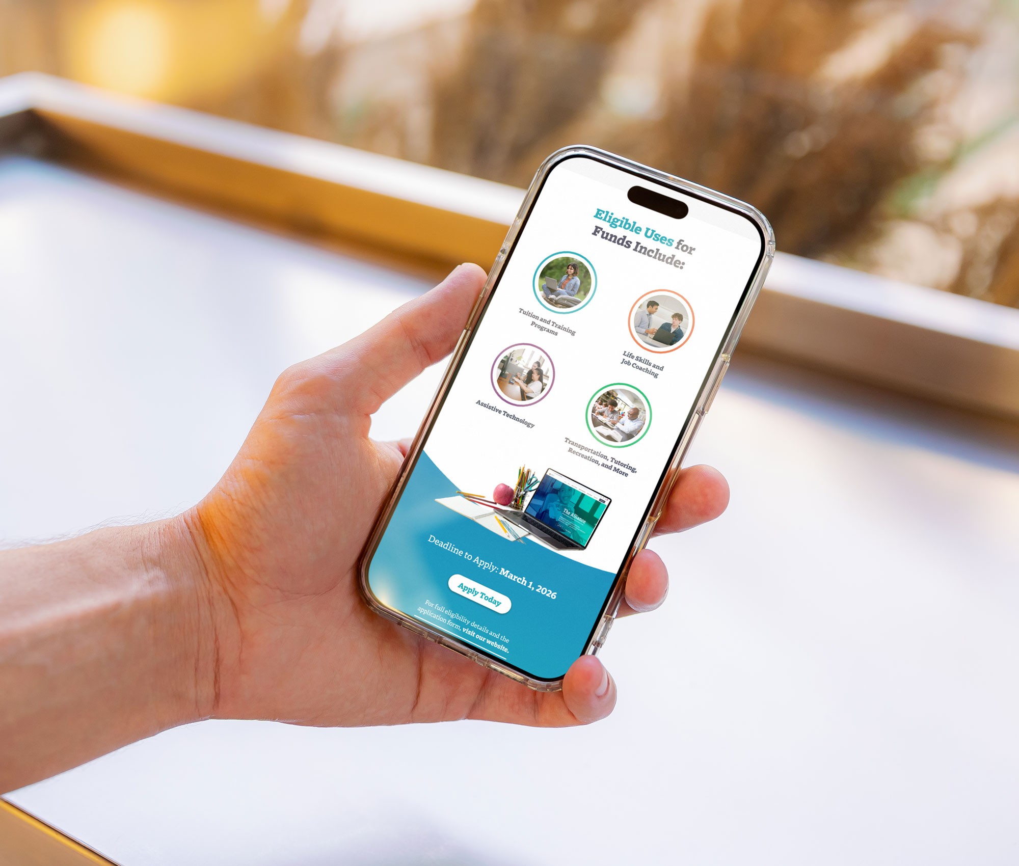 A person holding a smartphone looking at the Eligible Uses of the scholarship email