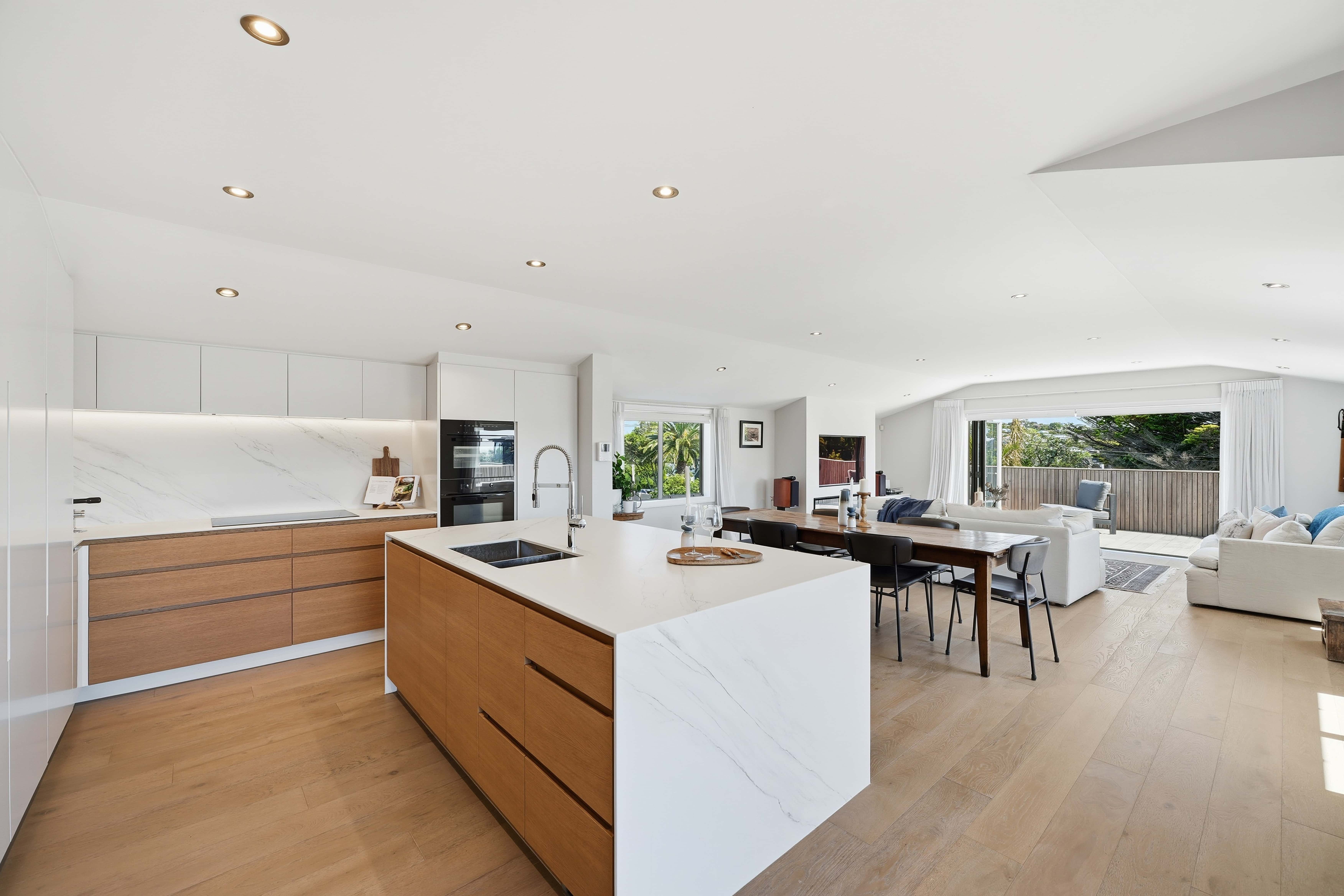 people sitting on chair in front of laptop computers