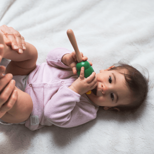 year-old-child-with-toys 1