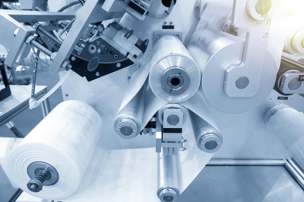 Pulley system feeding through a roll of film