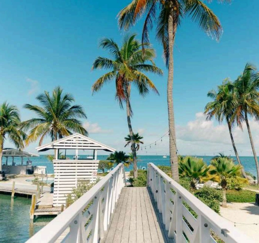 Nomade Tulum hotel room with private terrace pool at sunset.