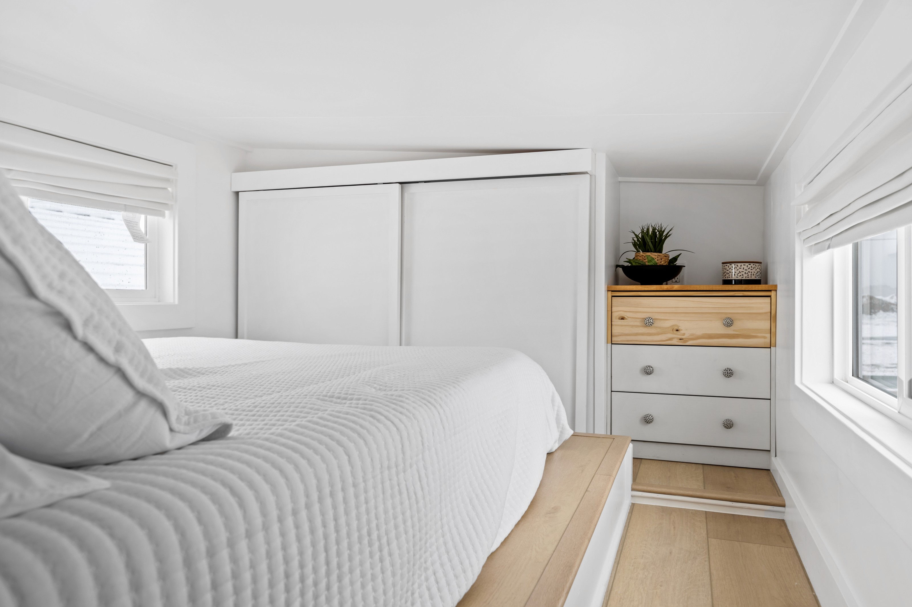 Great room in St. George Utah home with wood beams and retro-inspired detailing by Madsen Homes