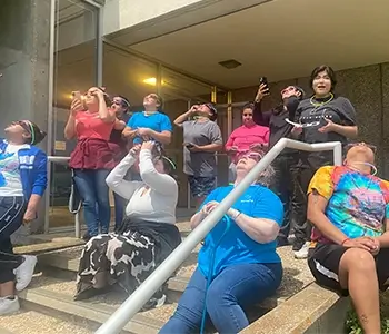 Group of Shamrock Employees Watching Total Solar Eclipse