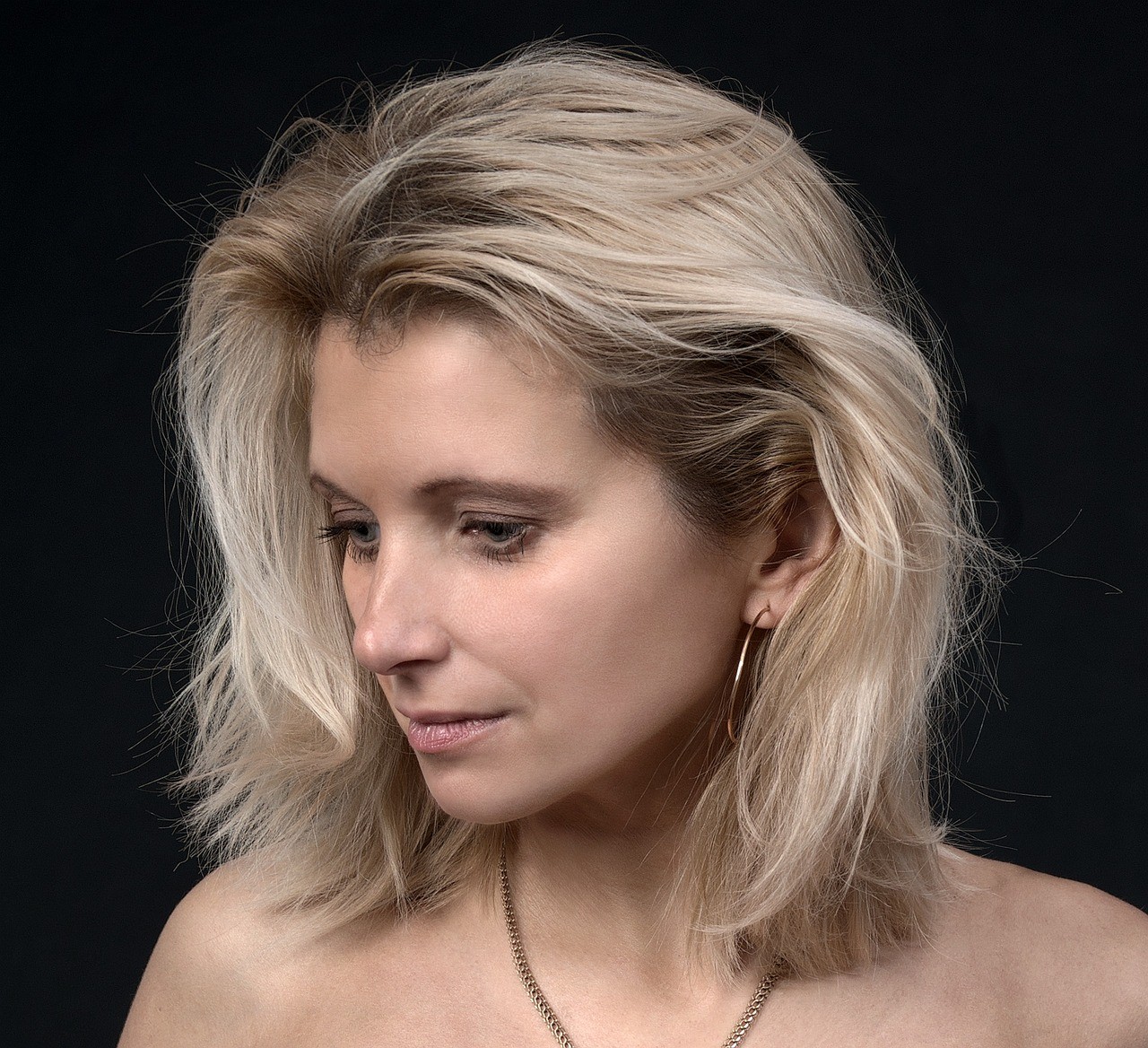 Beautiful happy woman with a gorgeous face after aesthetic services