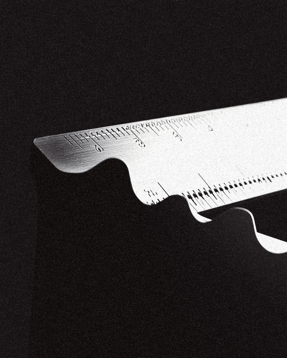 Minimal architectural scene with warm light and sharp geometric shadows across concrete surfaces