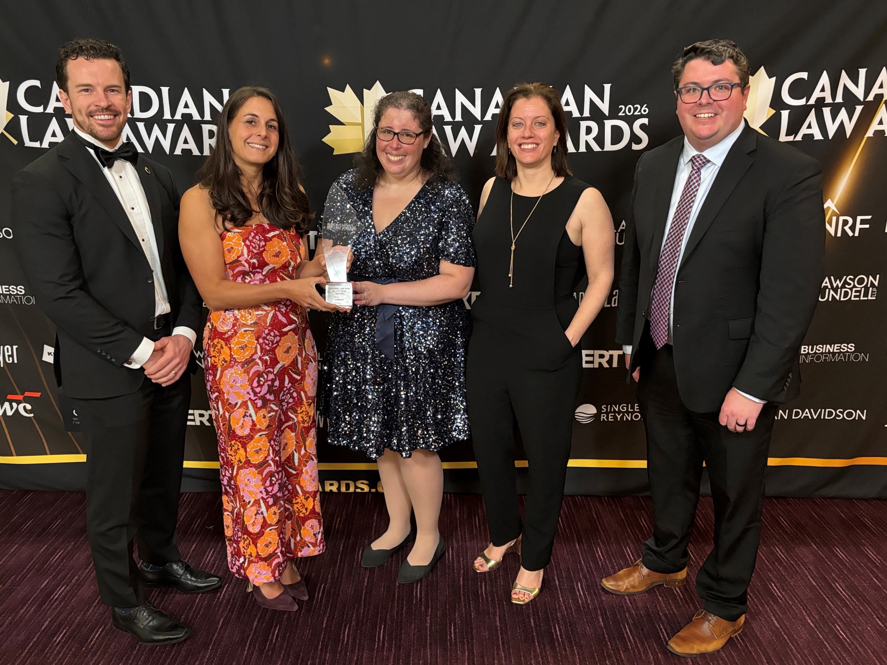 Group shot with award