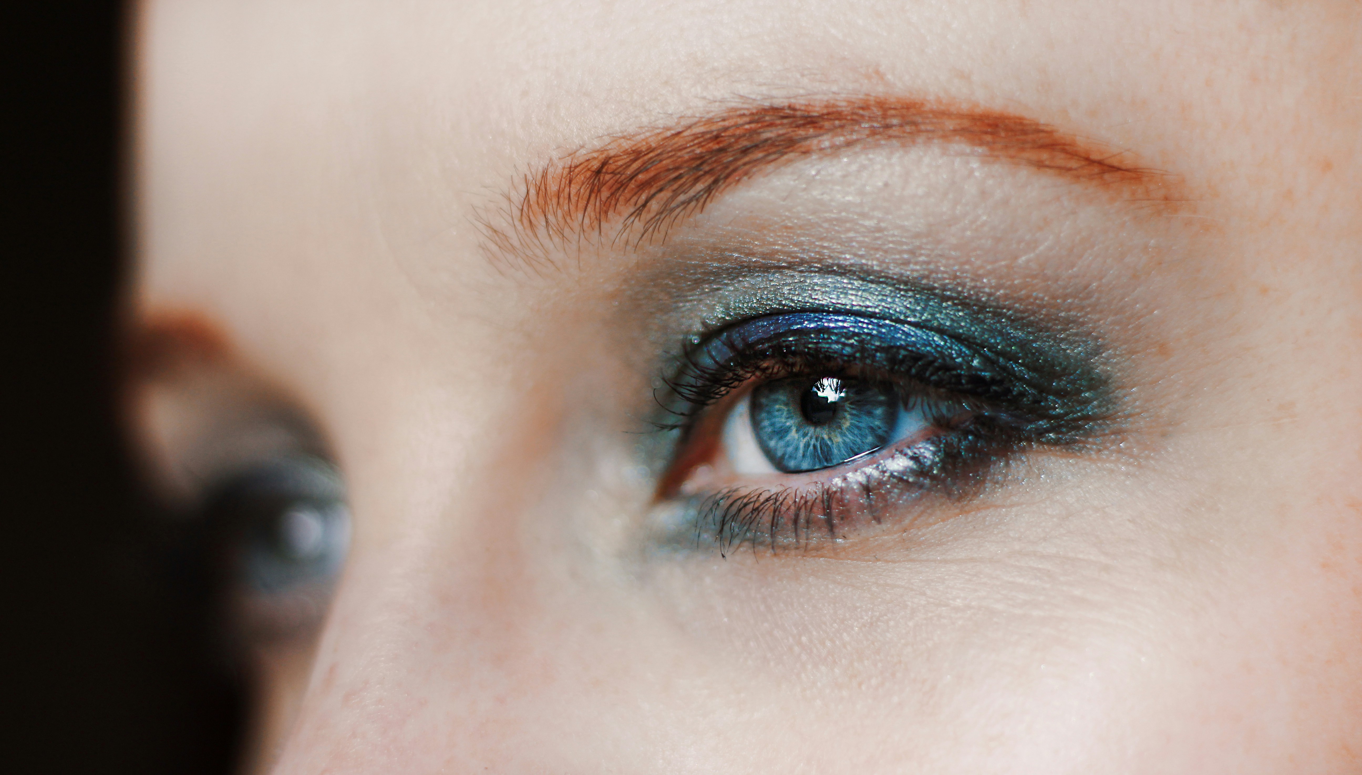 woman with blue eyeshadow -  How to Choose Eyeshadow Color According to Dress