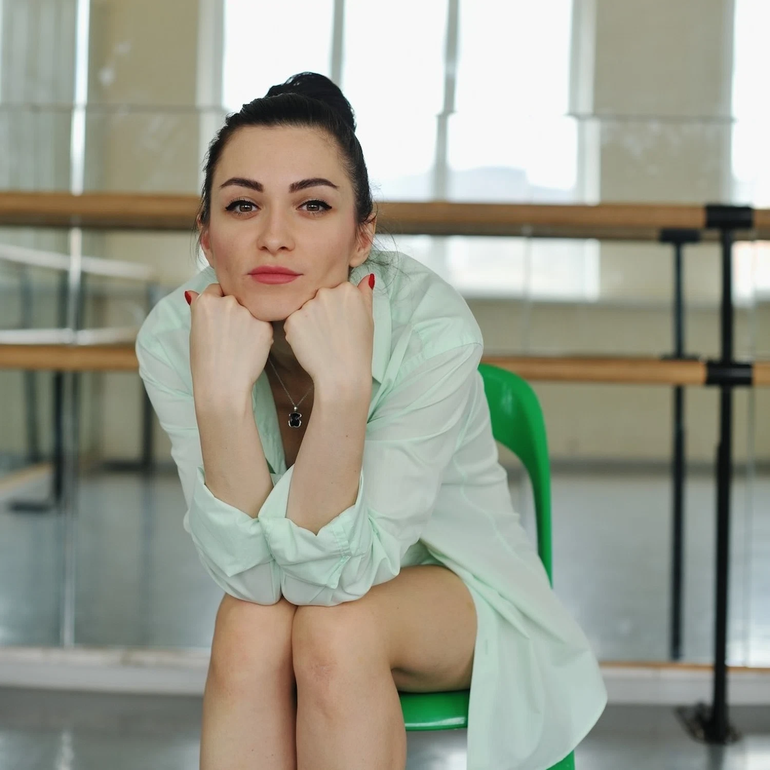 Woman sitting thoughtfully in a therapy room, reflecting during a depression therapy session in Los Angeles focused on emotional healing and self-awareness.