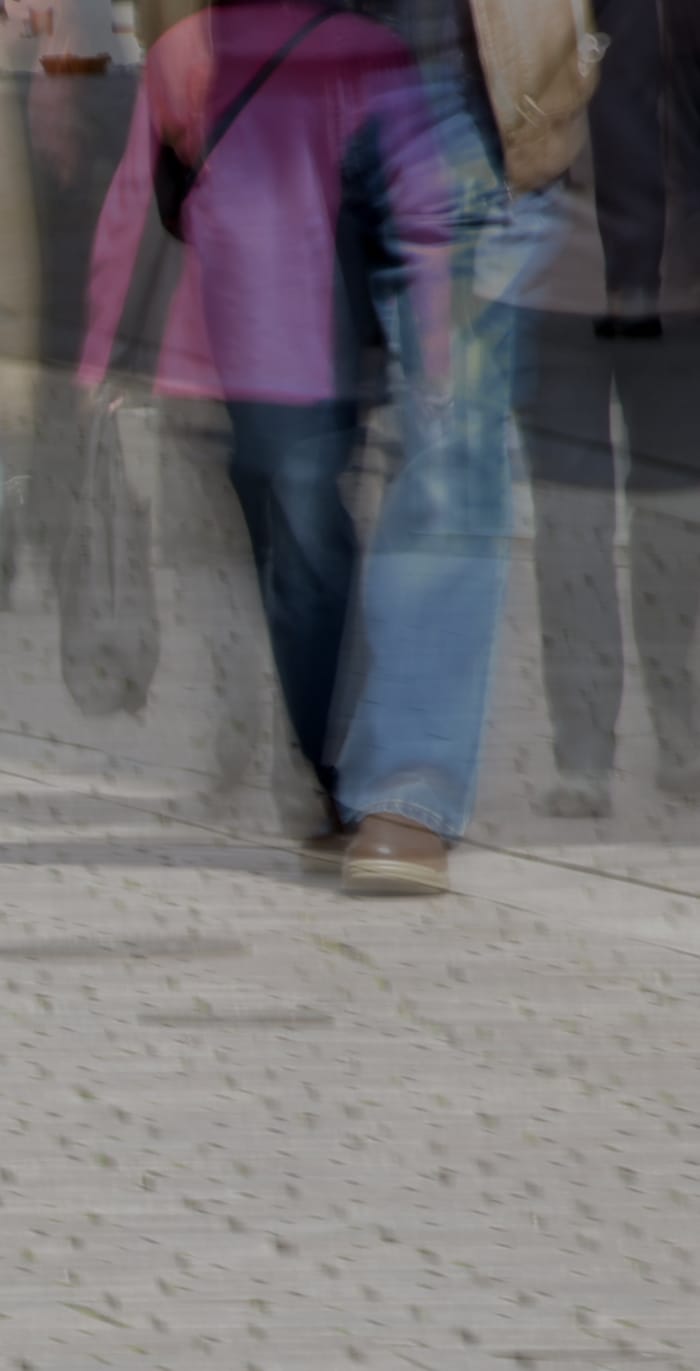 A busy and blurry street with a caption saying identify ai-driven market shifts and competitor moves before it's too late