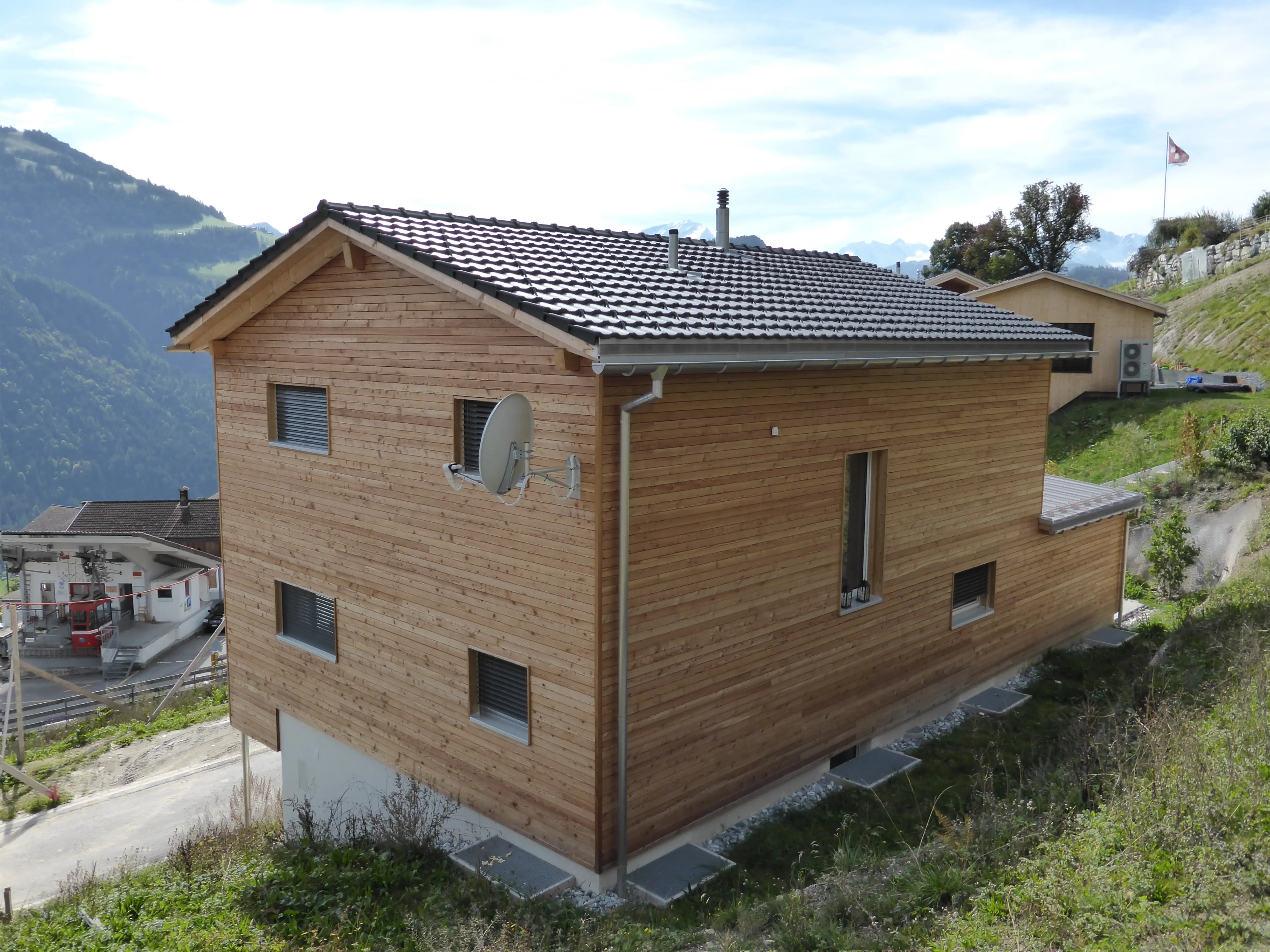 Neubau Einfamilienhaus Fanas Bau im Hang - Niggli Architektur