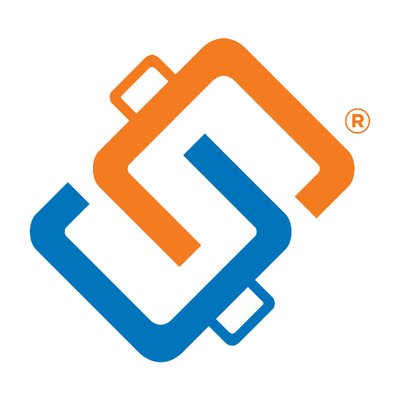 Close-up of a tree stump showing growth rings and a textured brown wood surface.