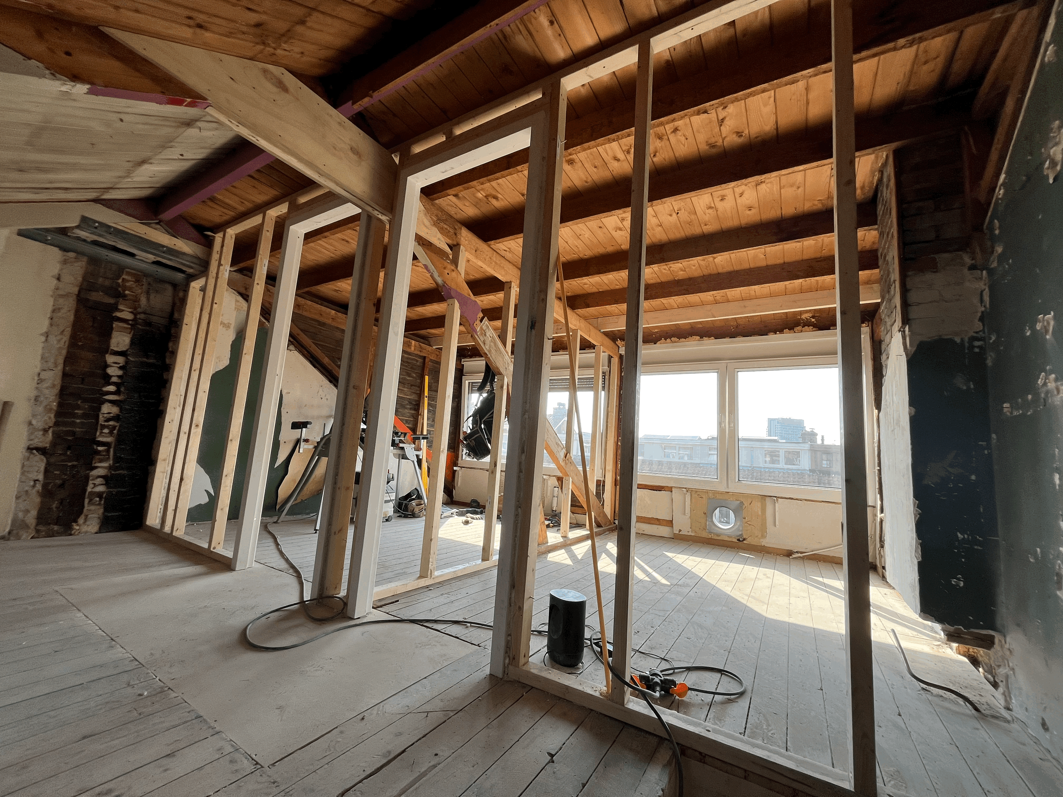 two people looking at a tablet and smiling