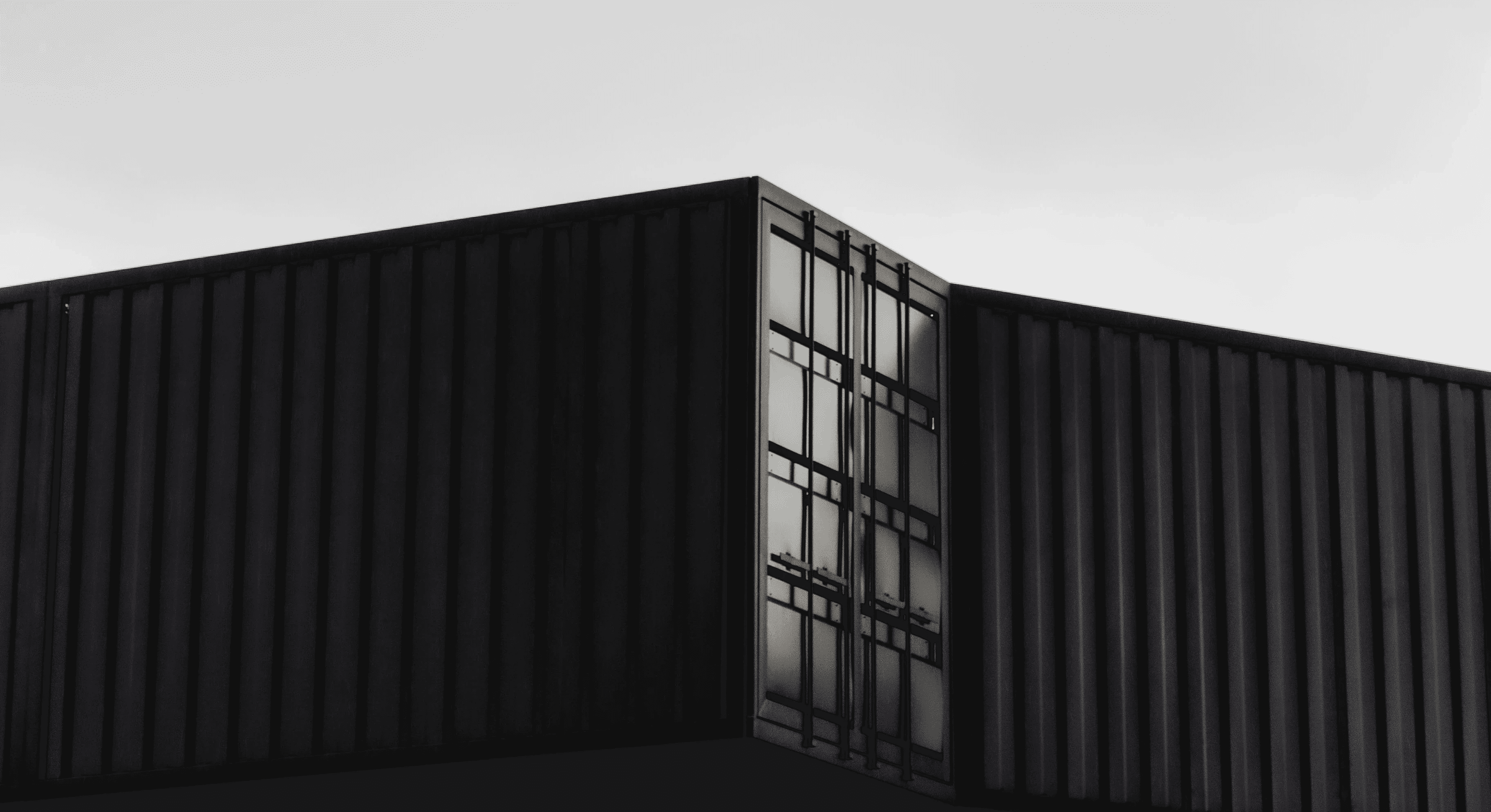 blue and red building under gray sky