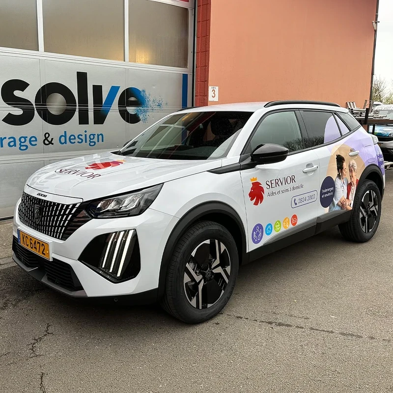 White SUV with stickers and car vinyl wrap