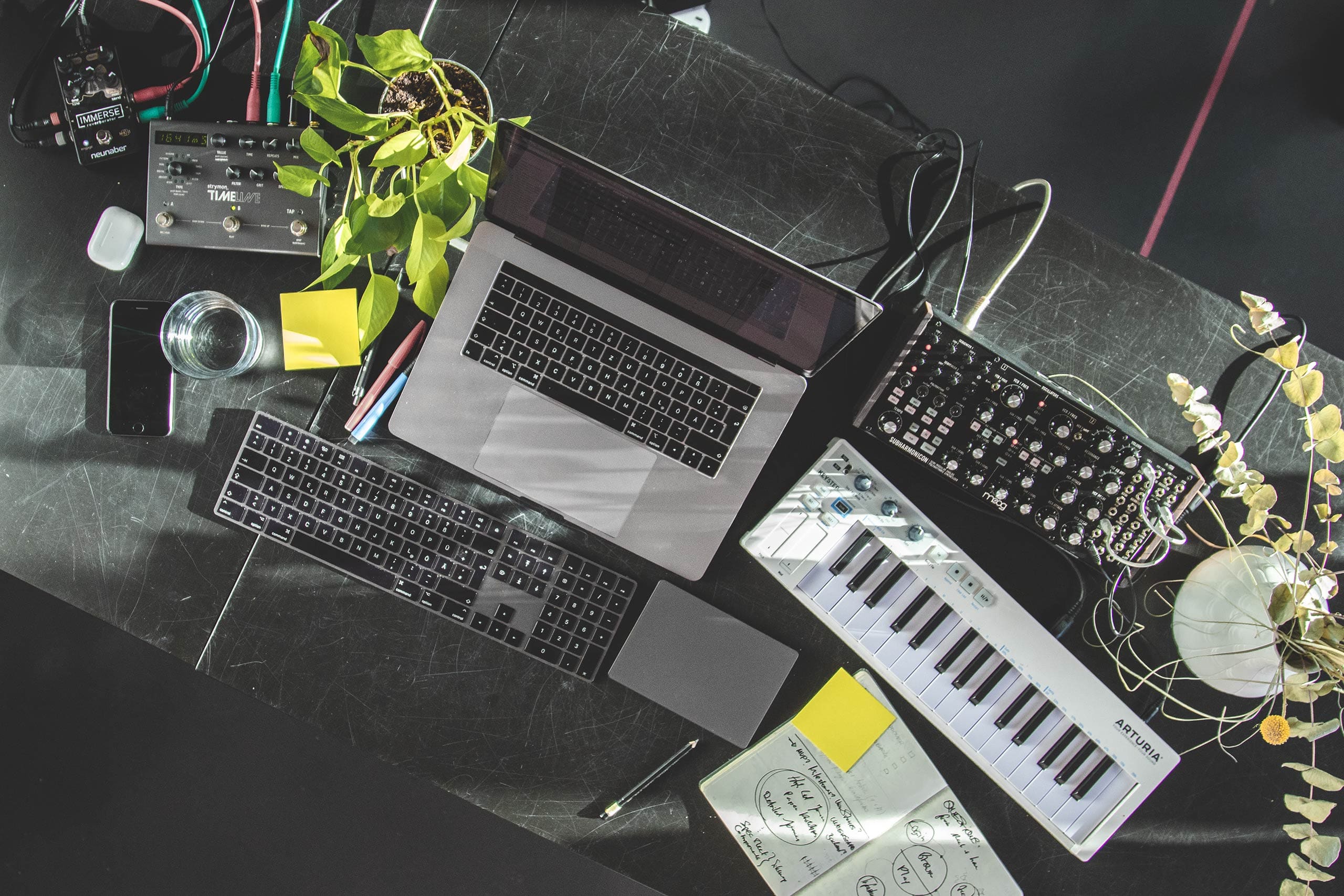 person playing black and white electric piano