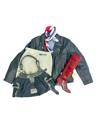 Arrangement of a jacket, jeans, scarf, bag, and boot against a black background.