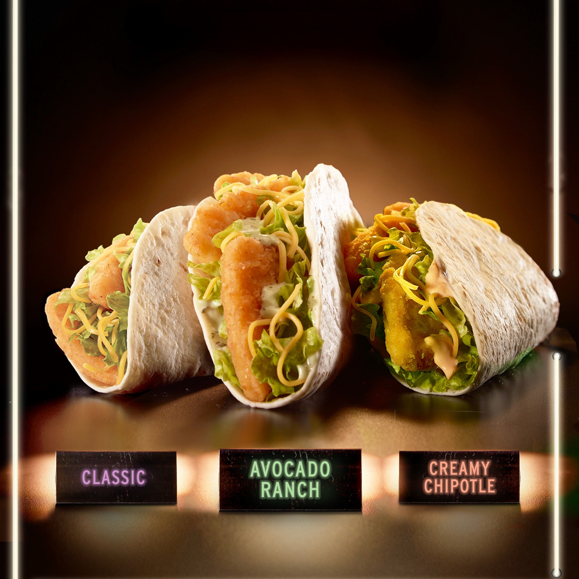 Crispy chicken tacos on platform