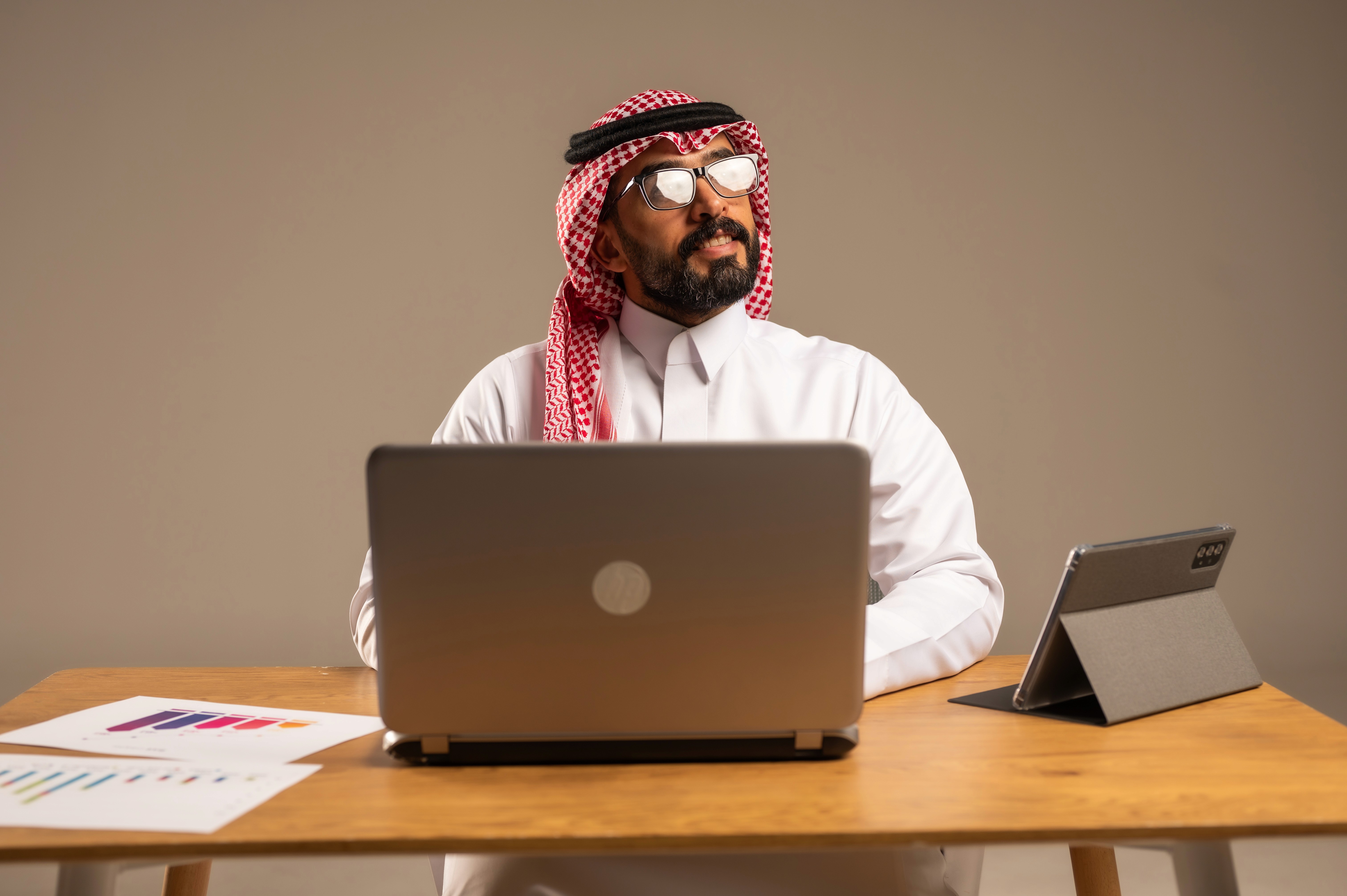 Man sitting infront of laptop