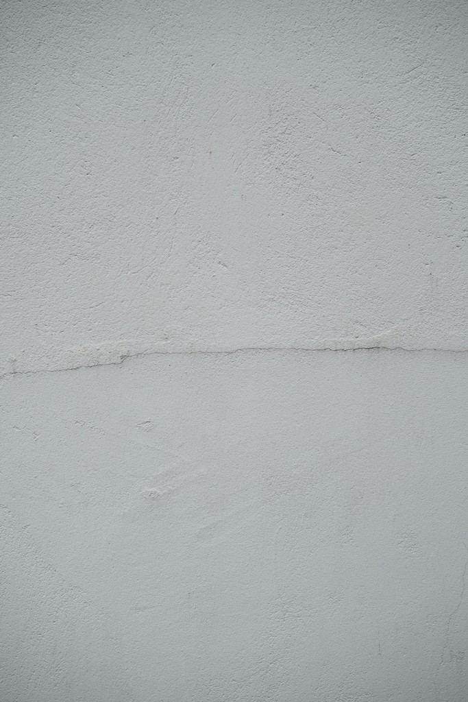 A plain, white wall.